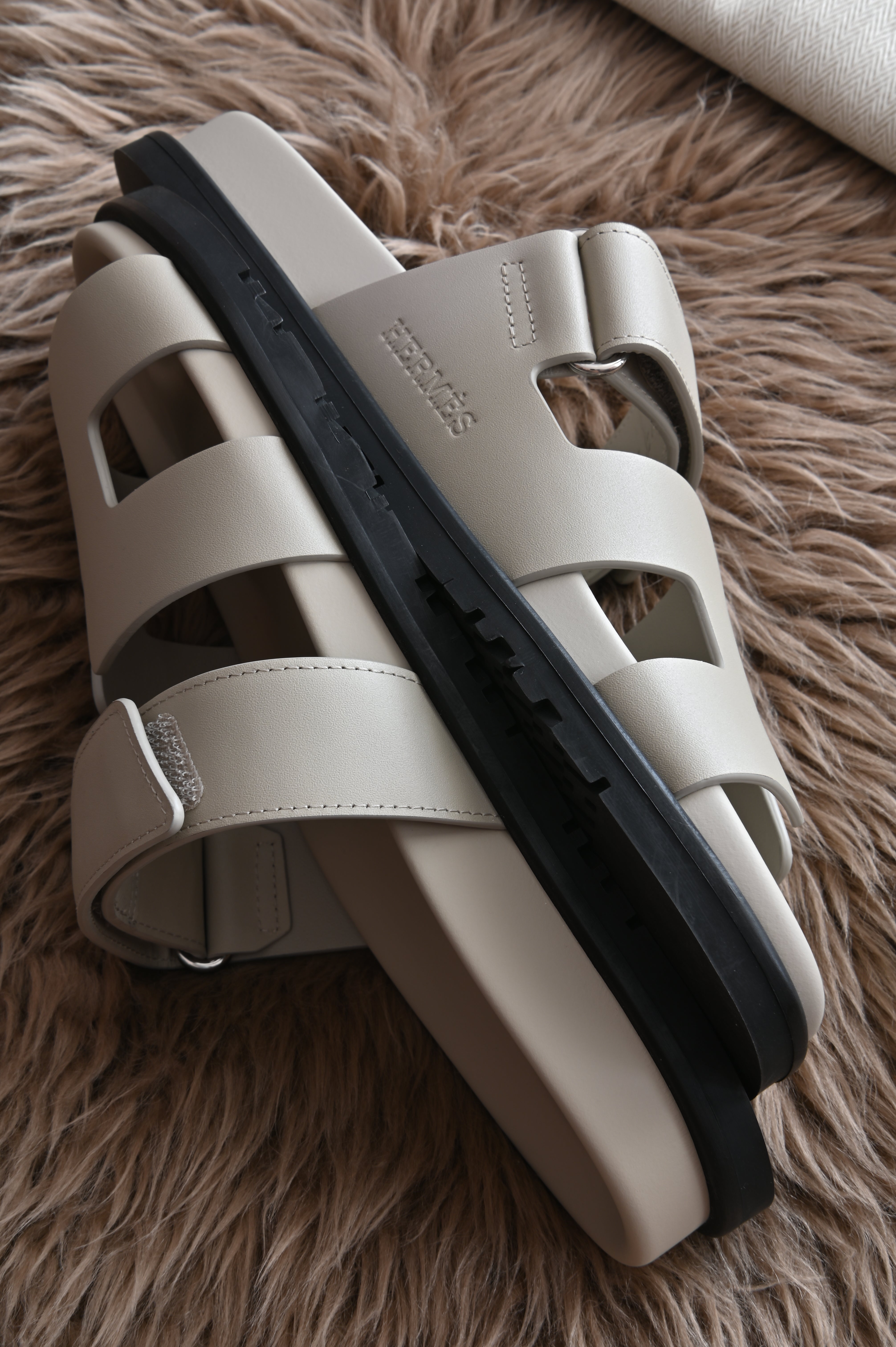 Hermes Chypre Sandals in Bone Grey