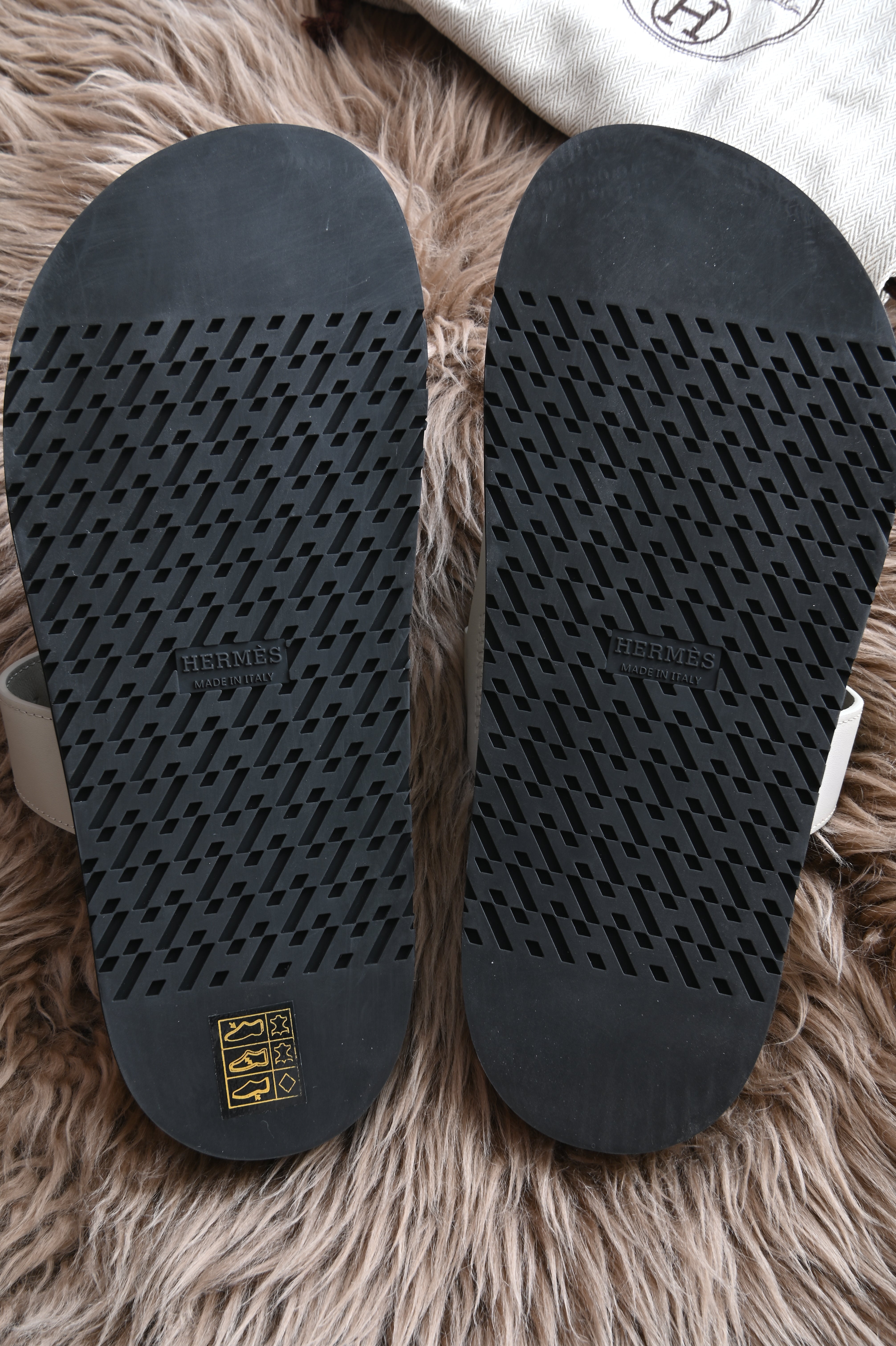 Hermes Chypre Sandals in Bone Grey
