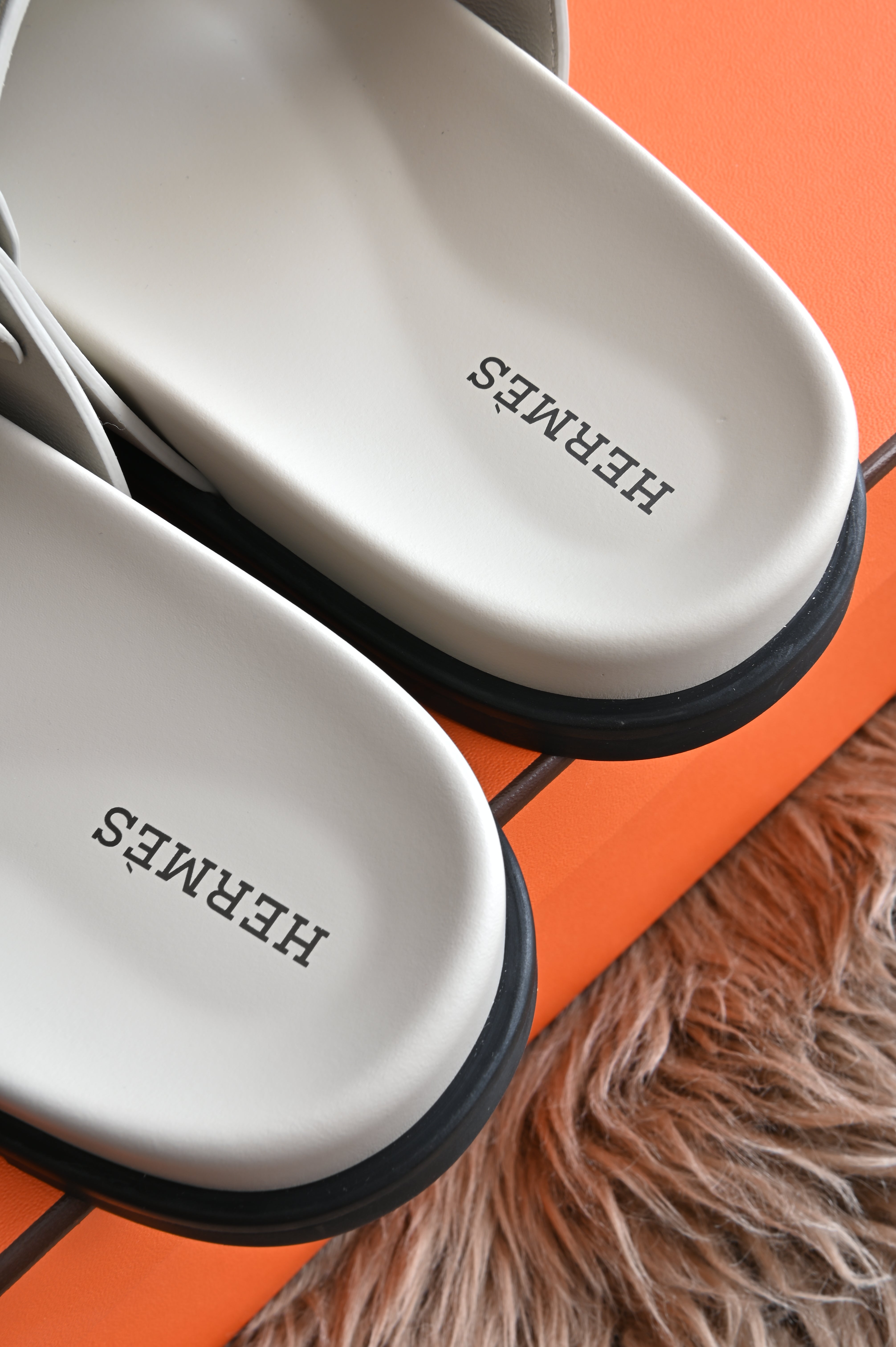 Hermes Chypre Sandals in Bone Grey