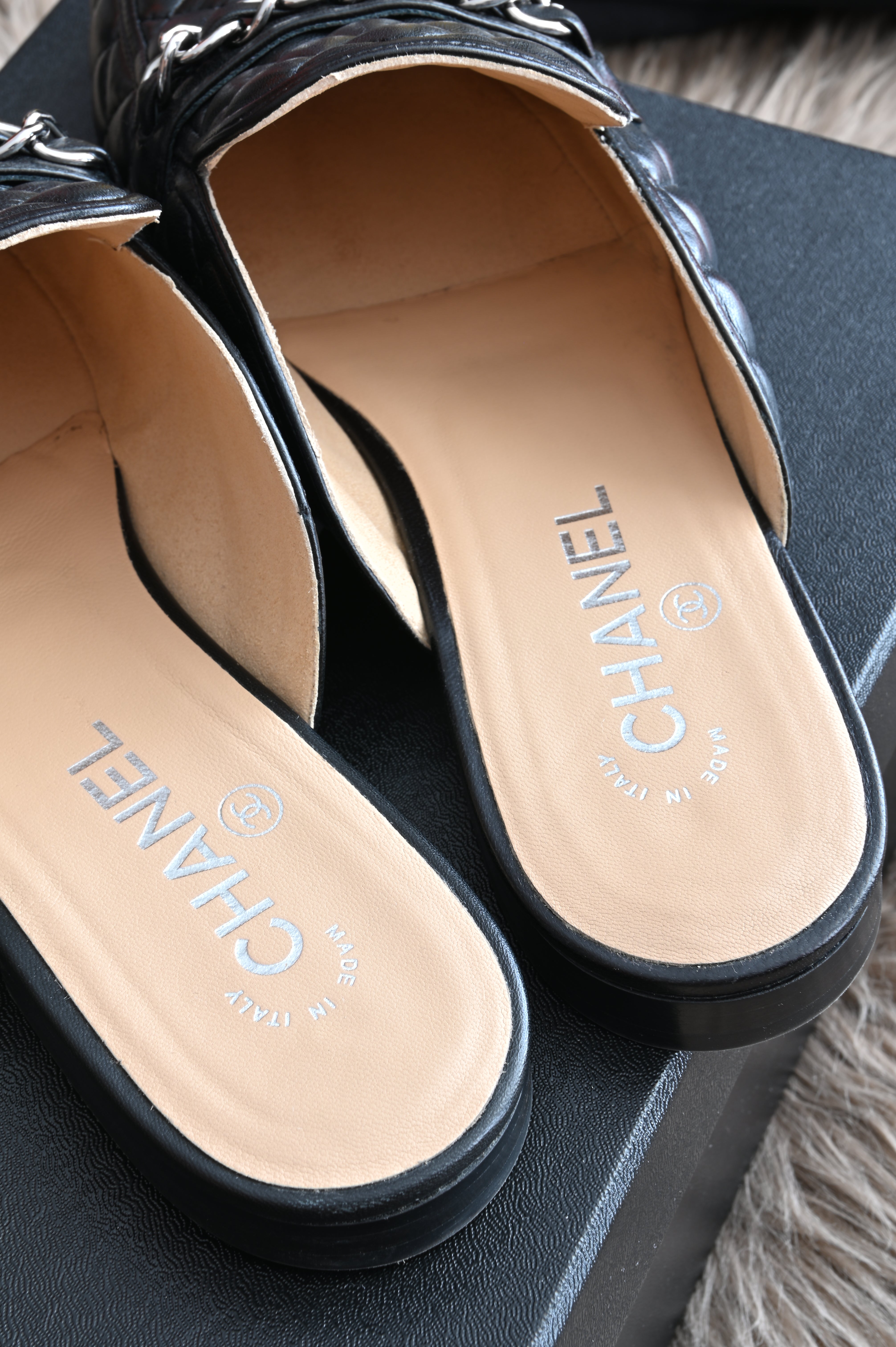 Chanel CC Quilted mules in black and silver hardware