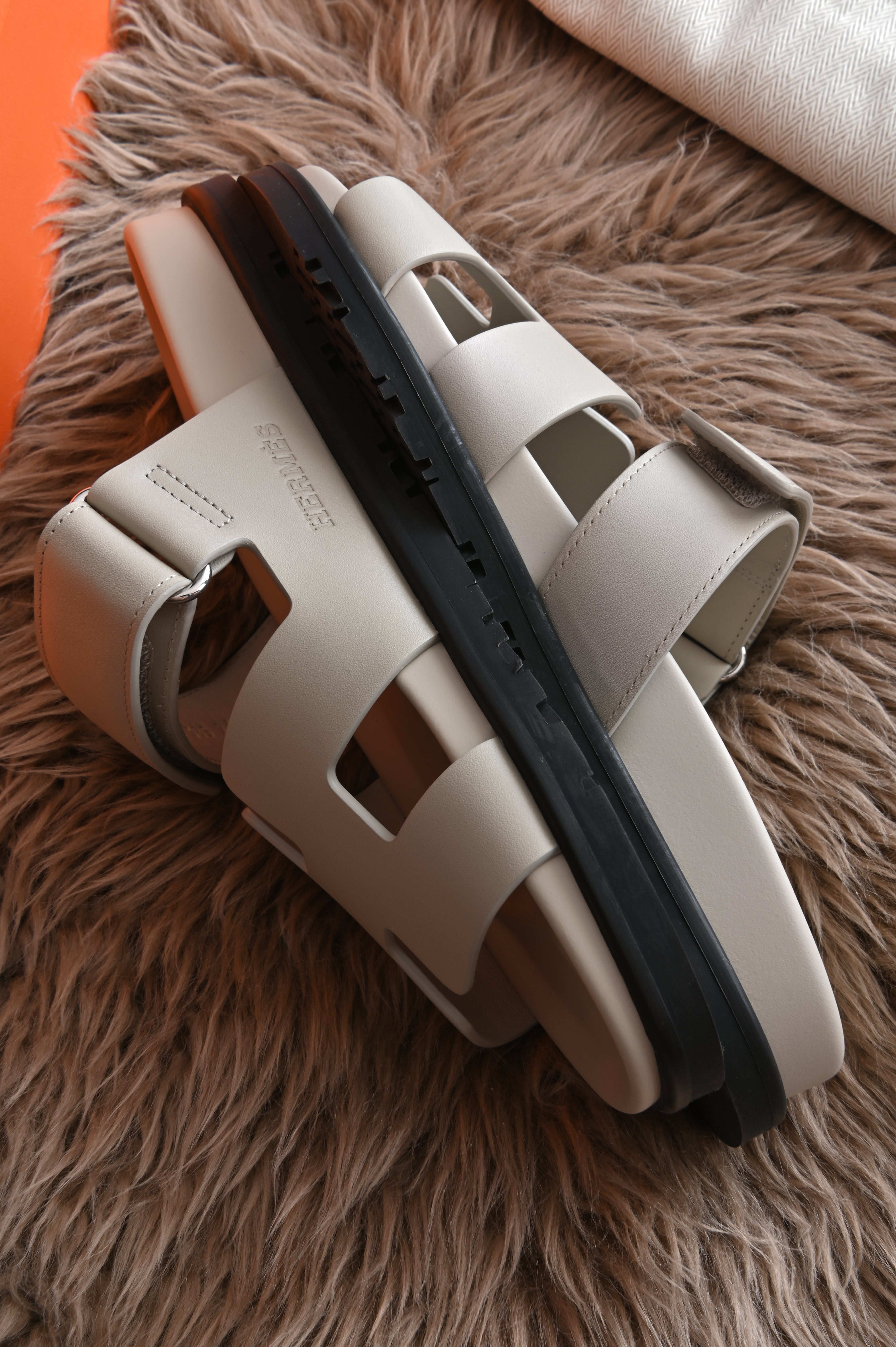 Hermes Chypre Sandals in Bone Grey