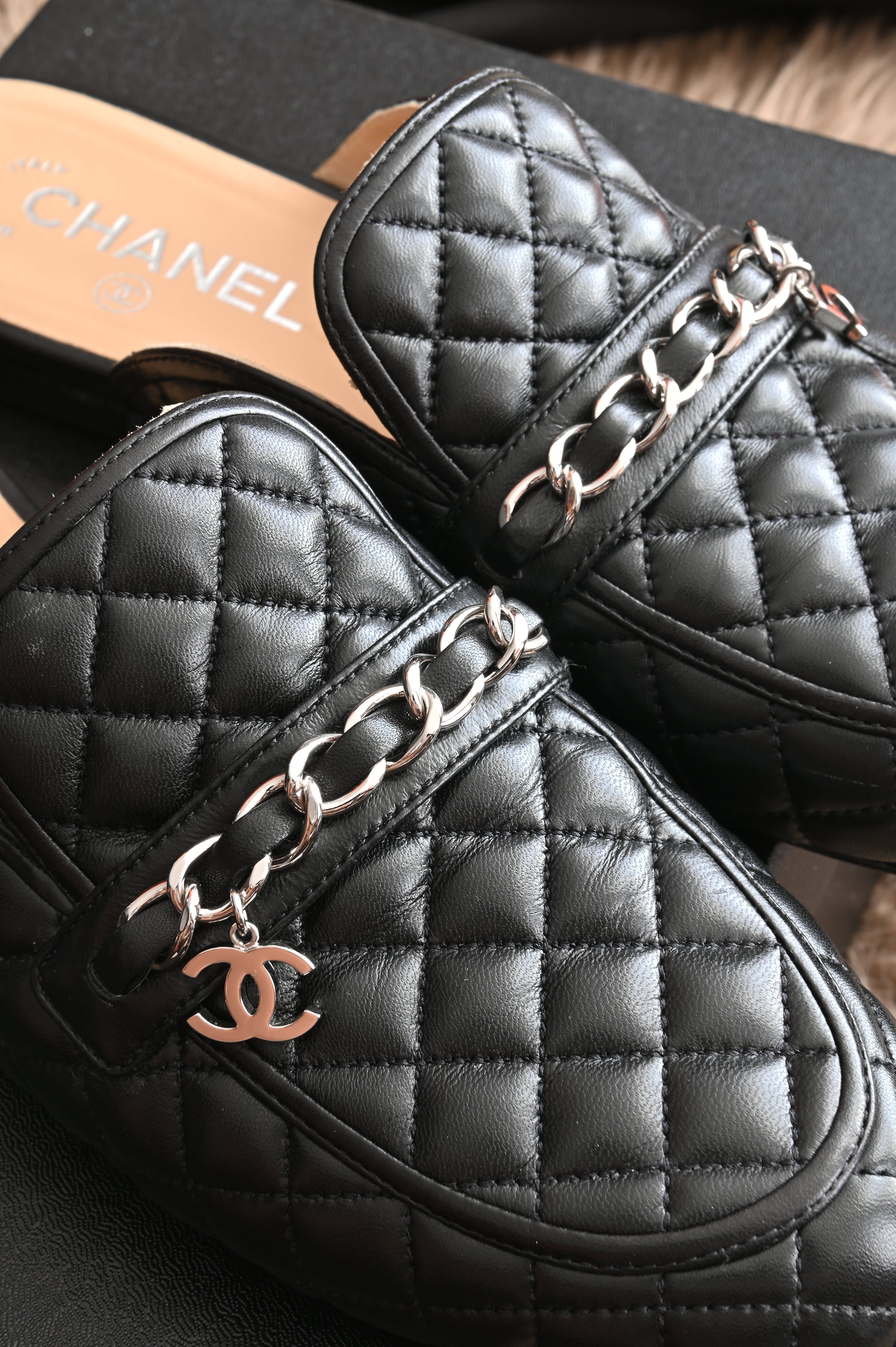 Chanel CC Quilted mules in black and silver hardware