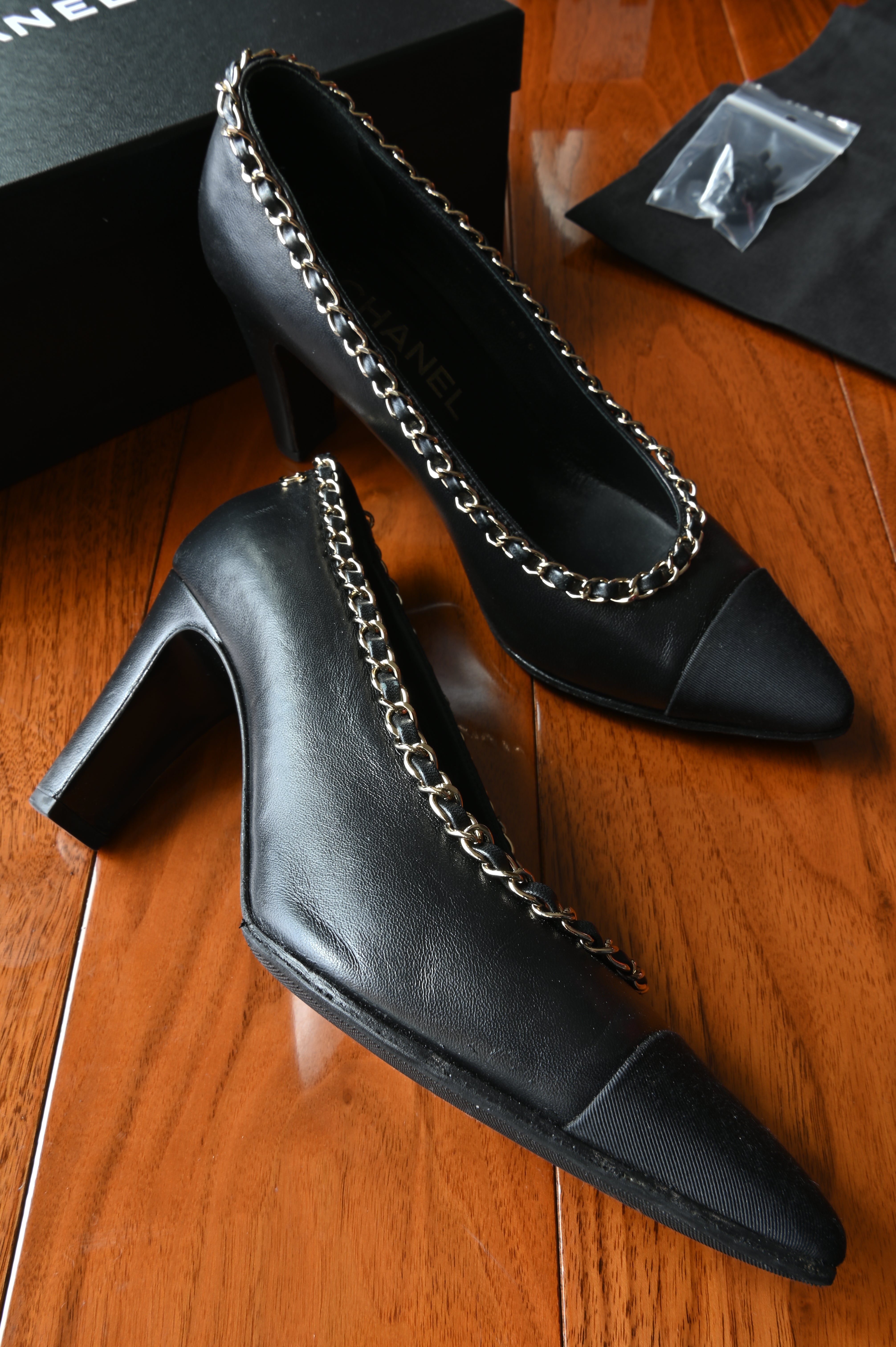 Chanel Black Lamb Leather Chain Pumps left