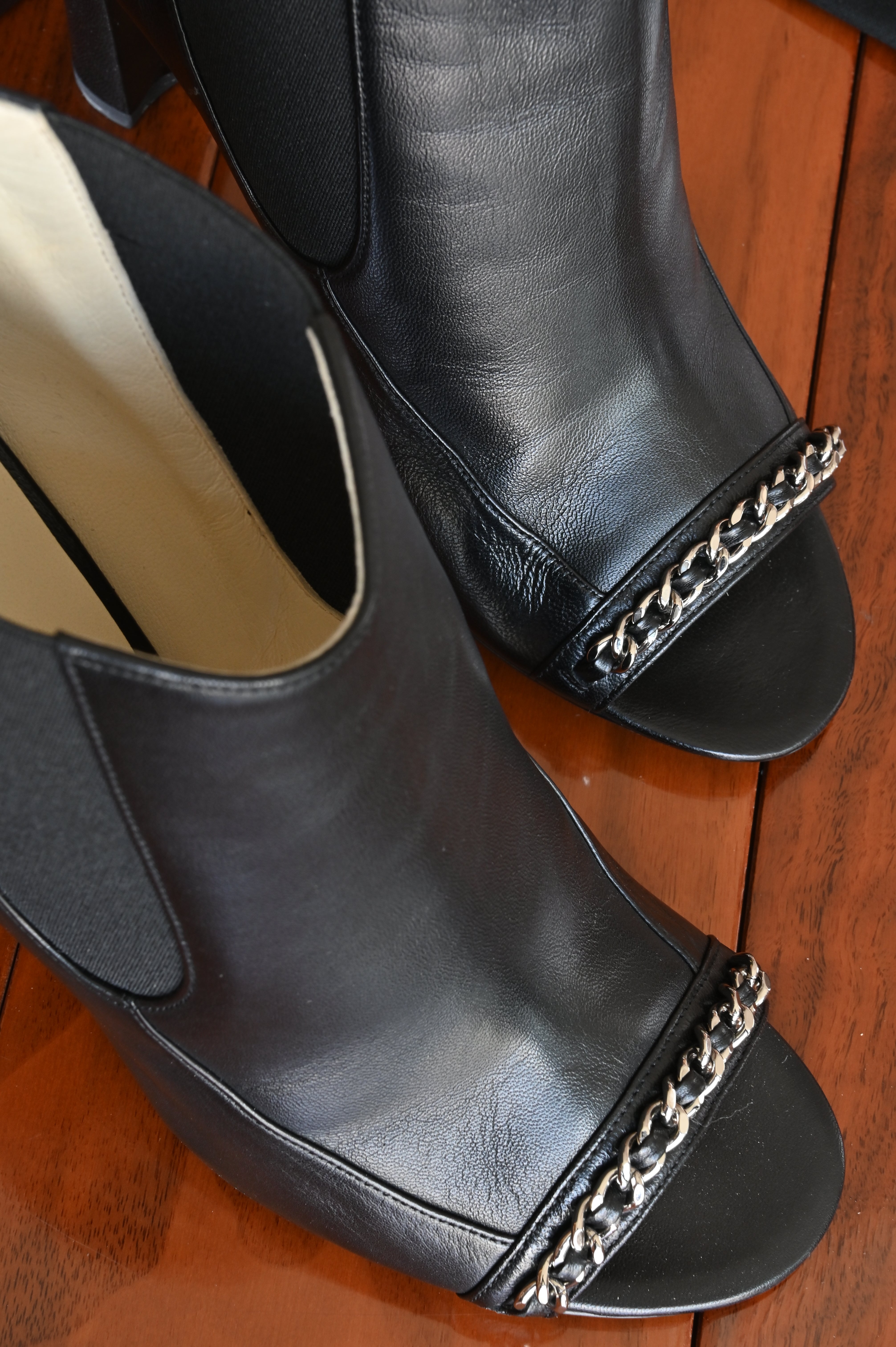 Chanel Black Leather Chain Open Boots detail