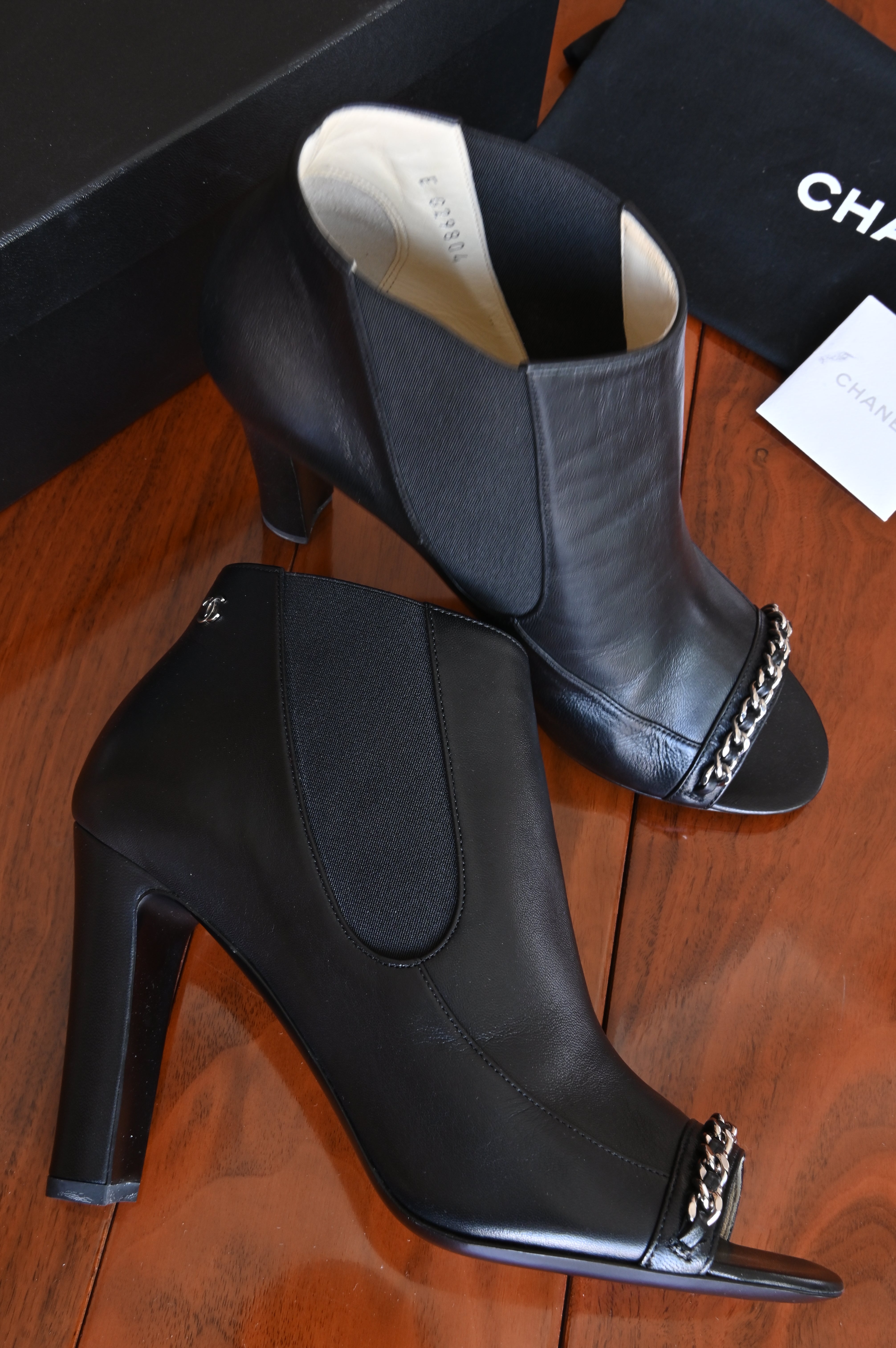 Chanel Black Leather Chain Open Boots left