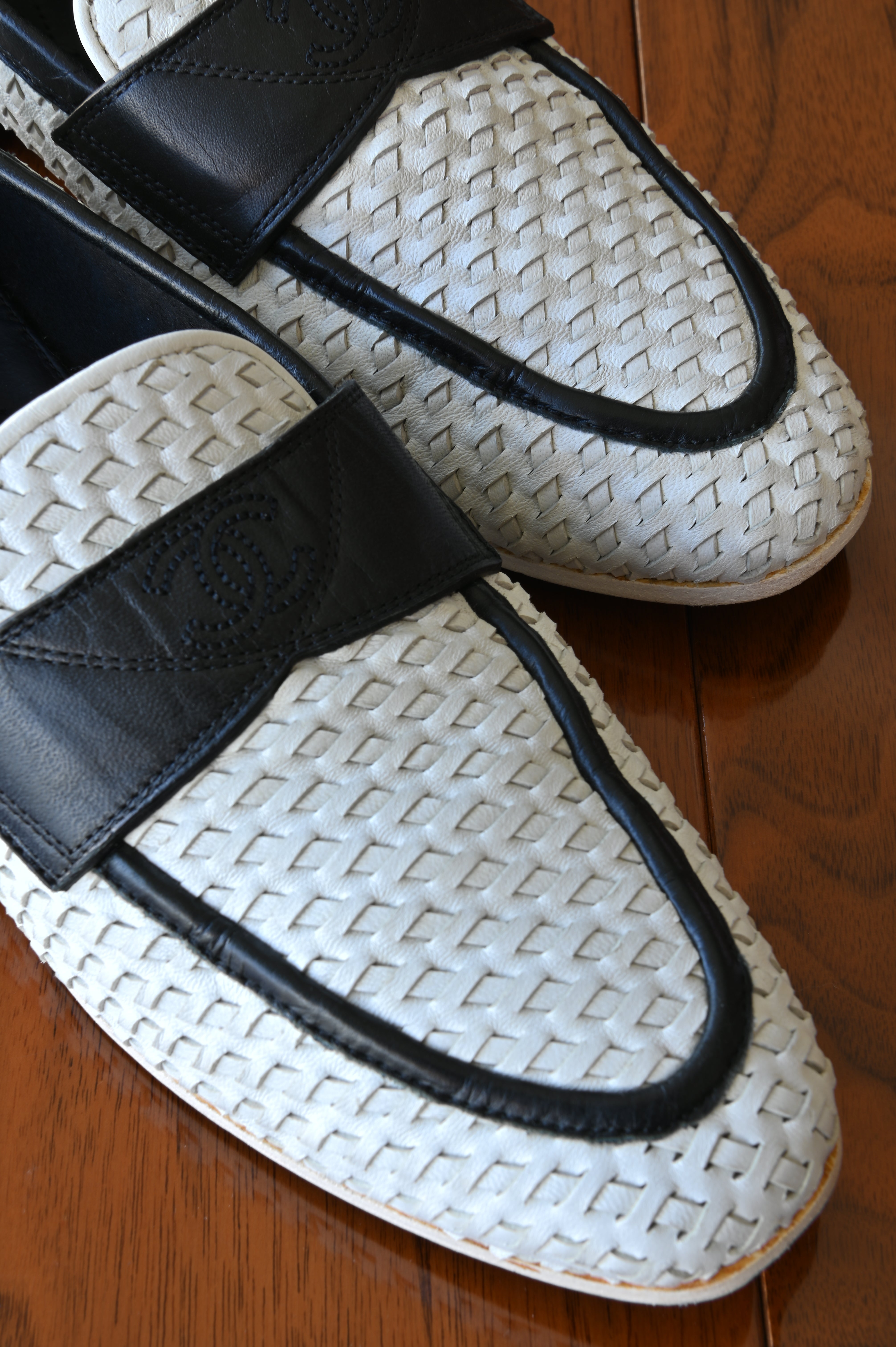 Chanel Black White Woven Leather Loafers front