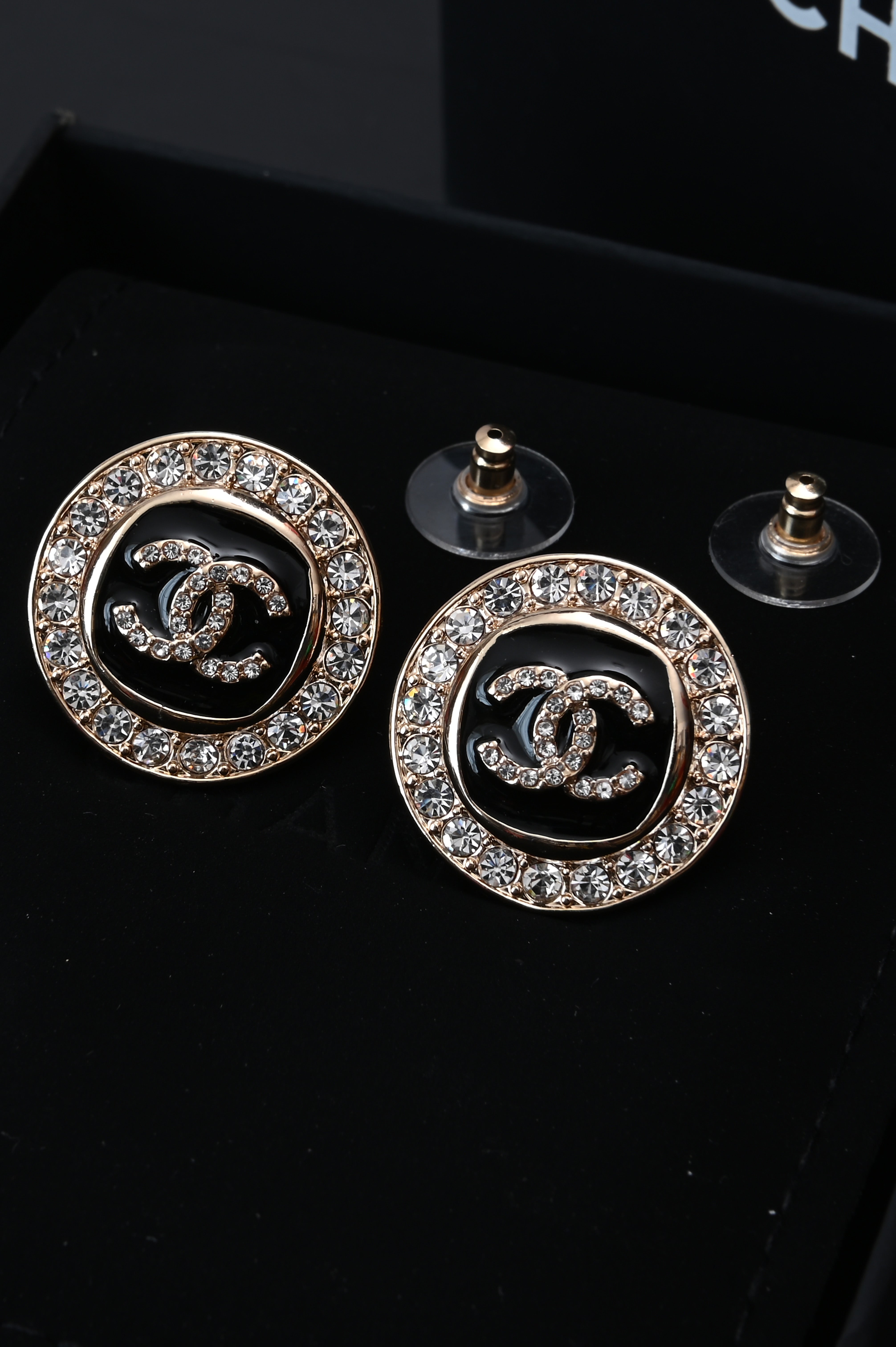 Chanel CC button earrings with crystals B25