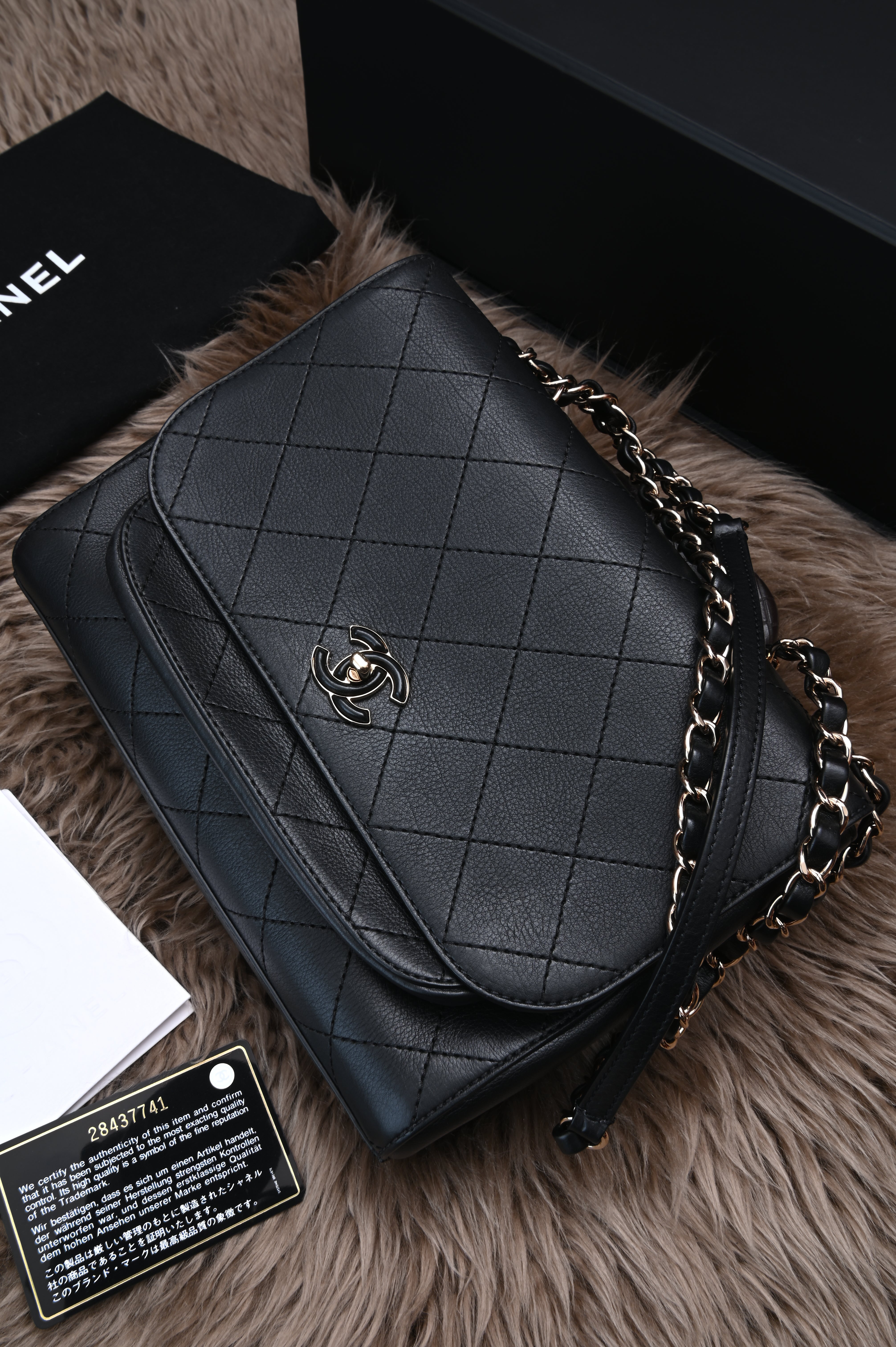 Chanel CC quilted flap bag in black calfskin