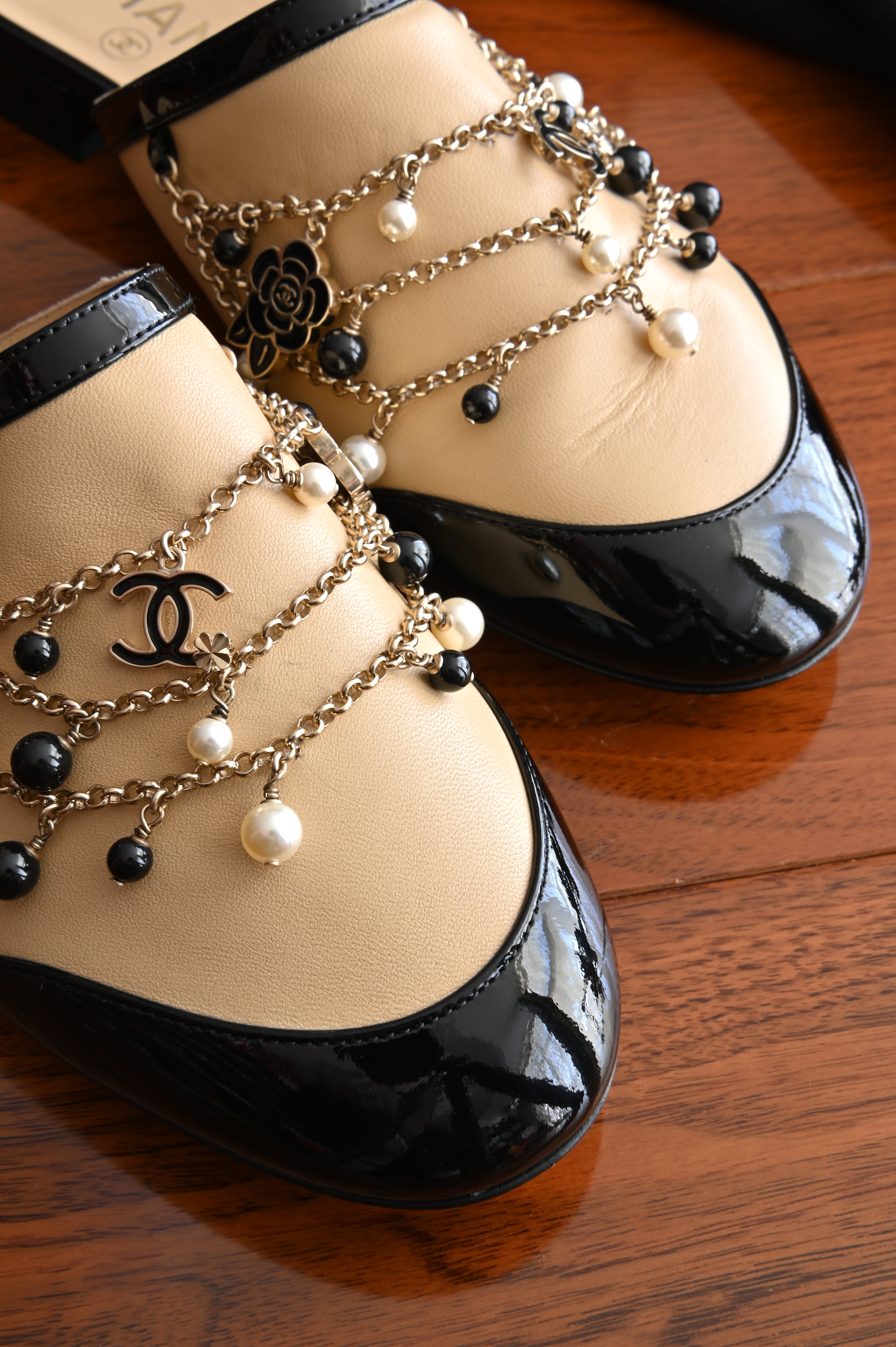 Chanel Pearl Charmed Chain Mules front two