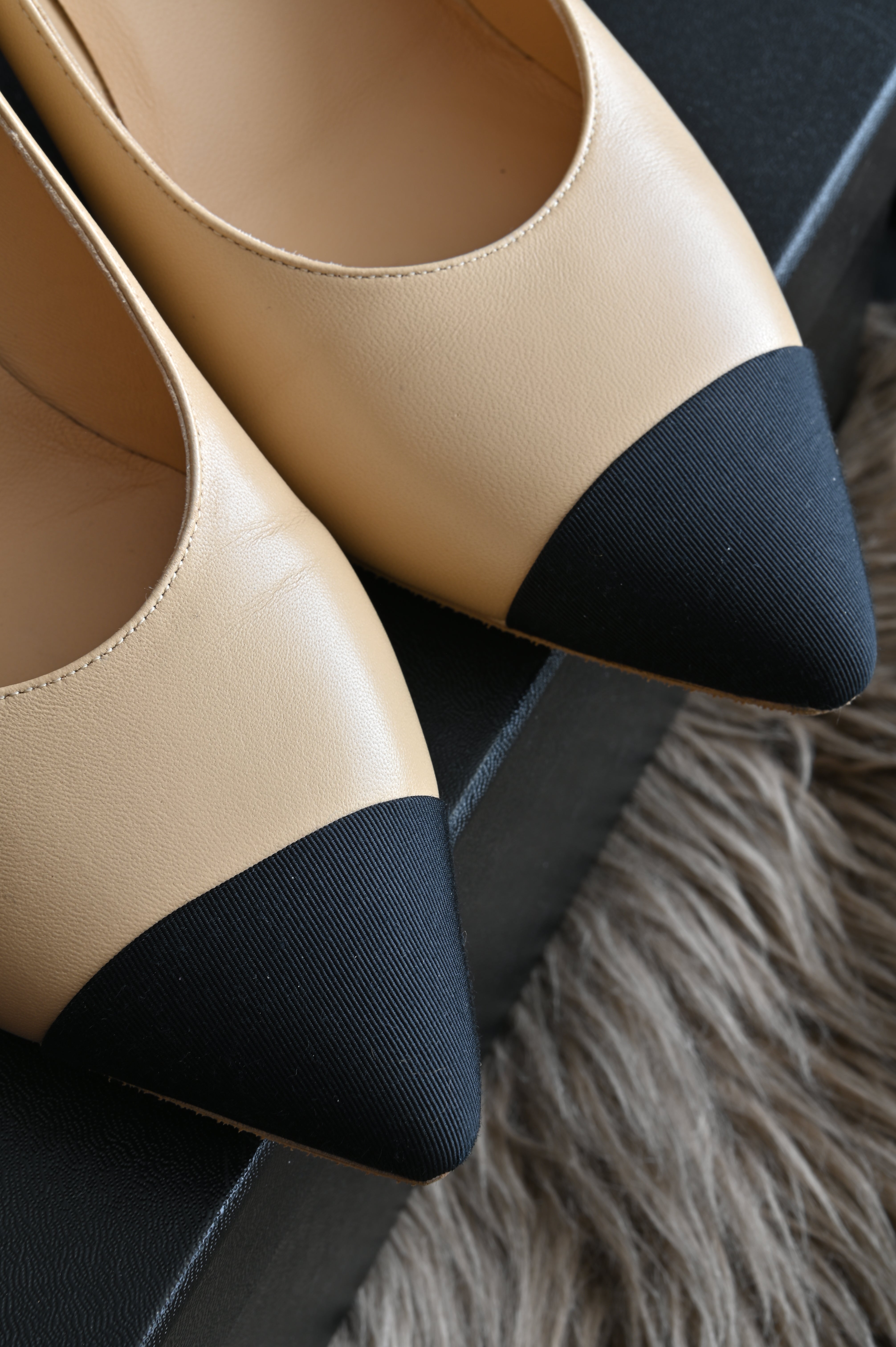 Chanel Pearl heels Two Tone Beige Black pumps close up