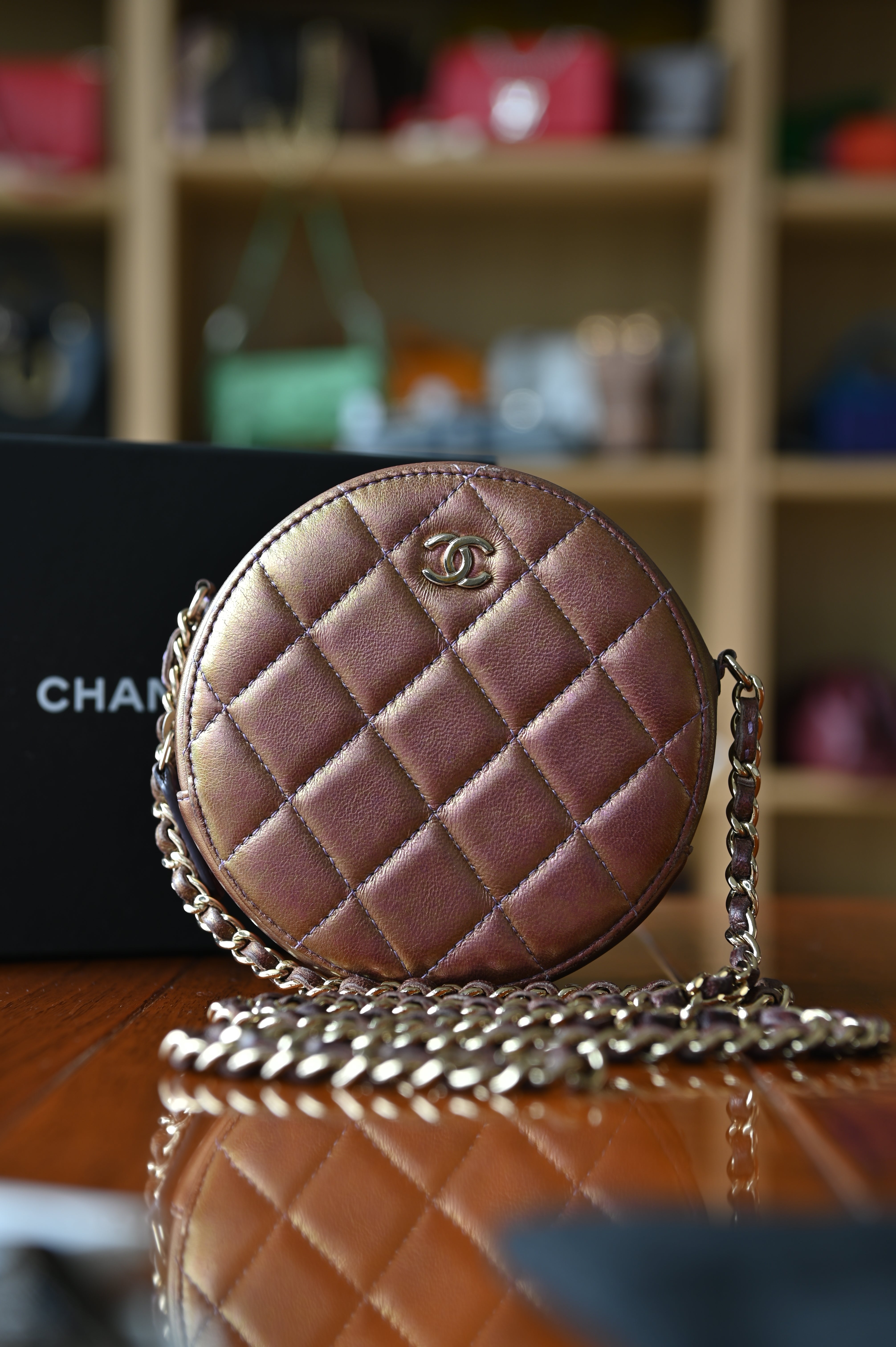 Chanel Purple Quilted Iridescent Round Sling Bag