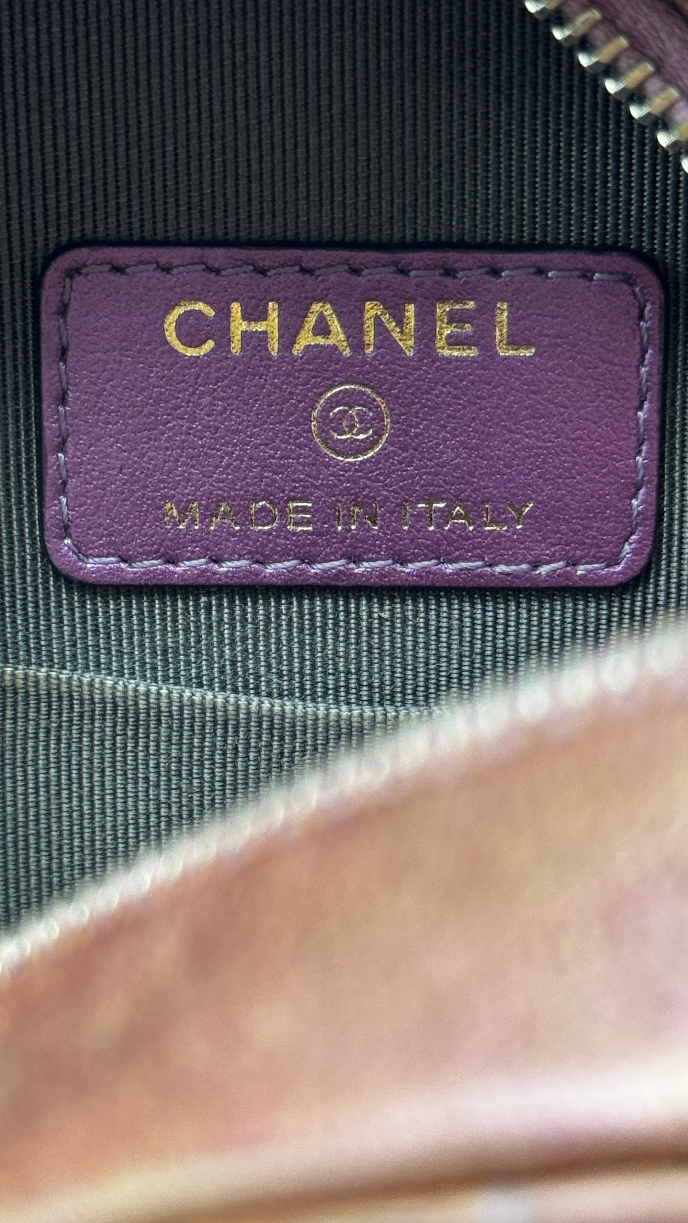 Chanel Purple Quilted Iridescent Round Sling Bag logo