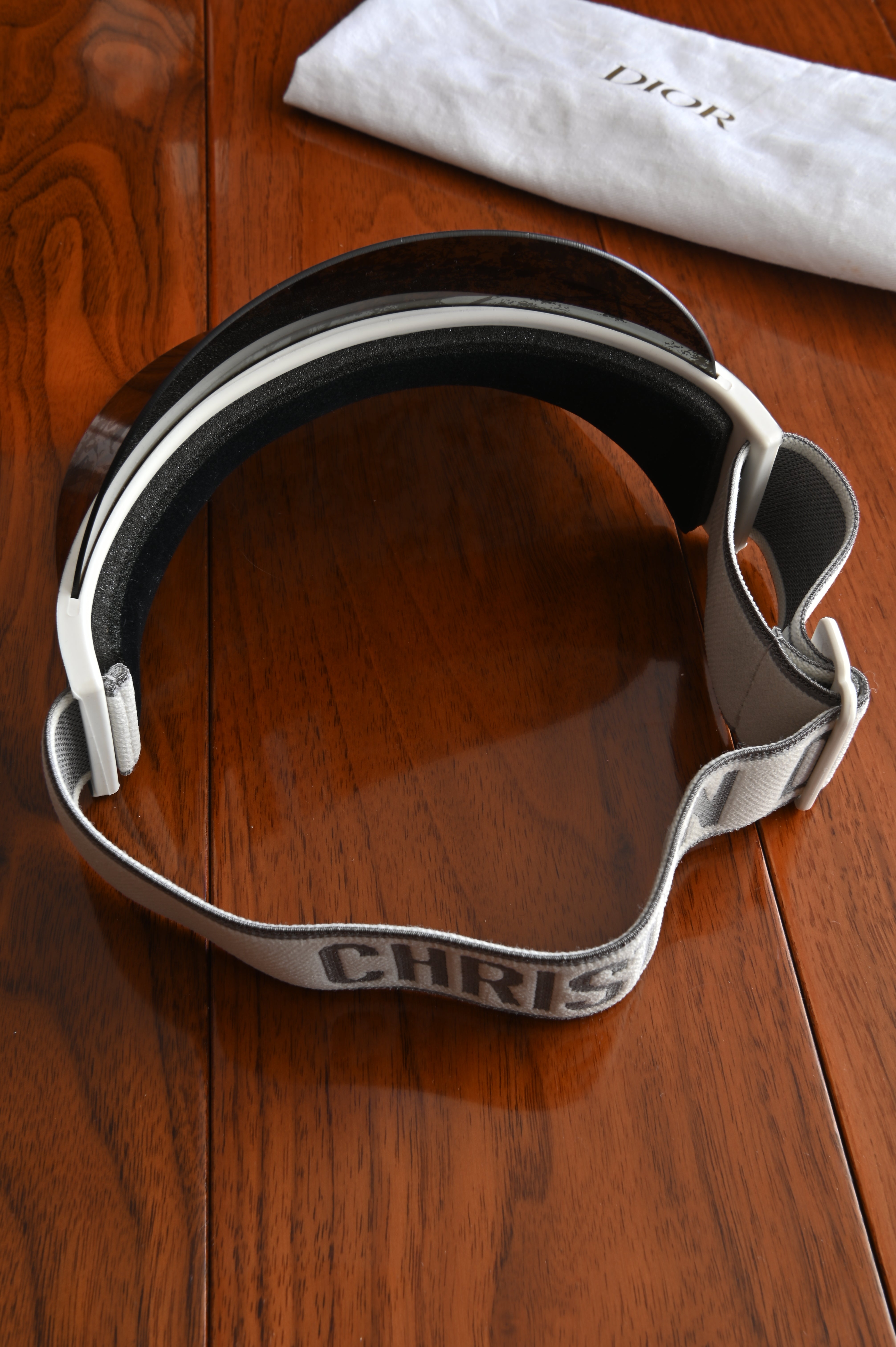 Christian Dior DiorClub V1U visor with a black and silver patterned brim back