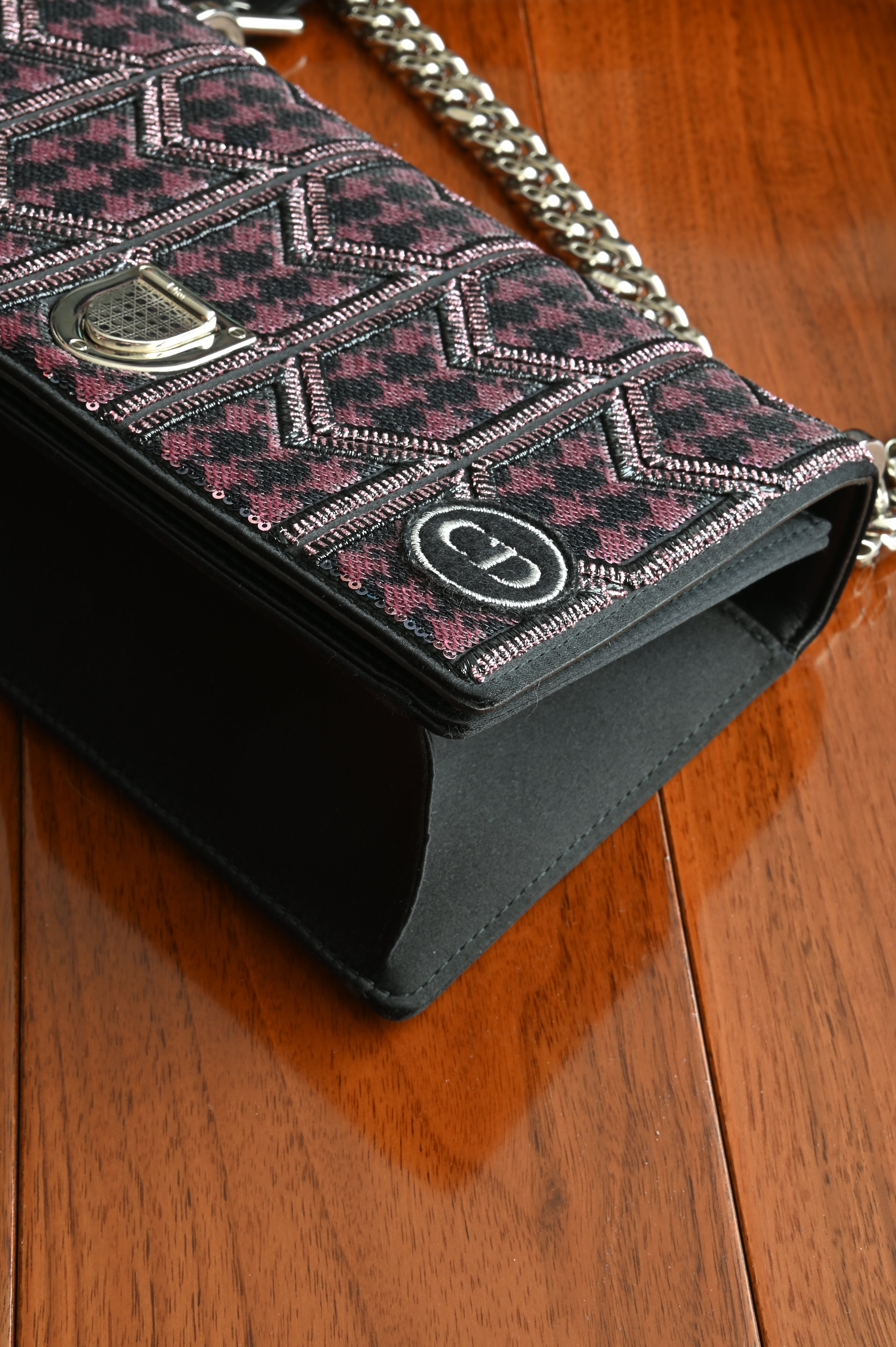 Christian Dior Sequin Diorama in pink and black right corner