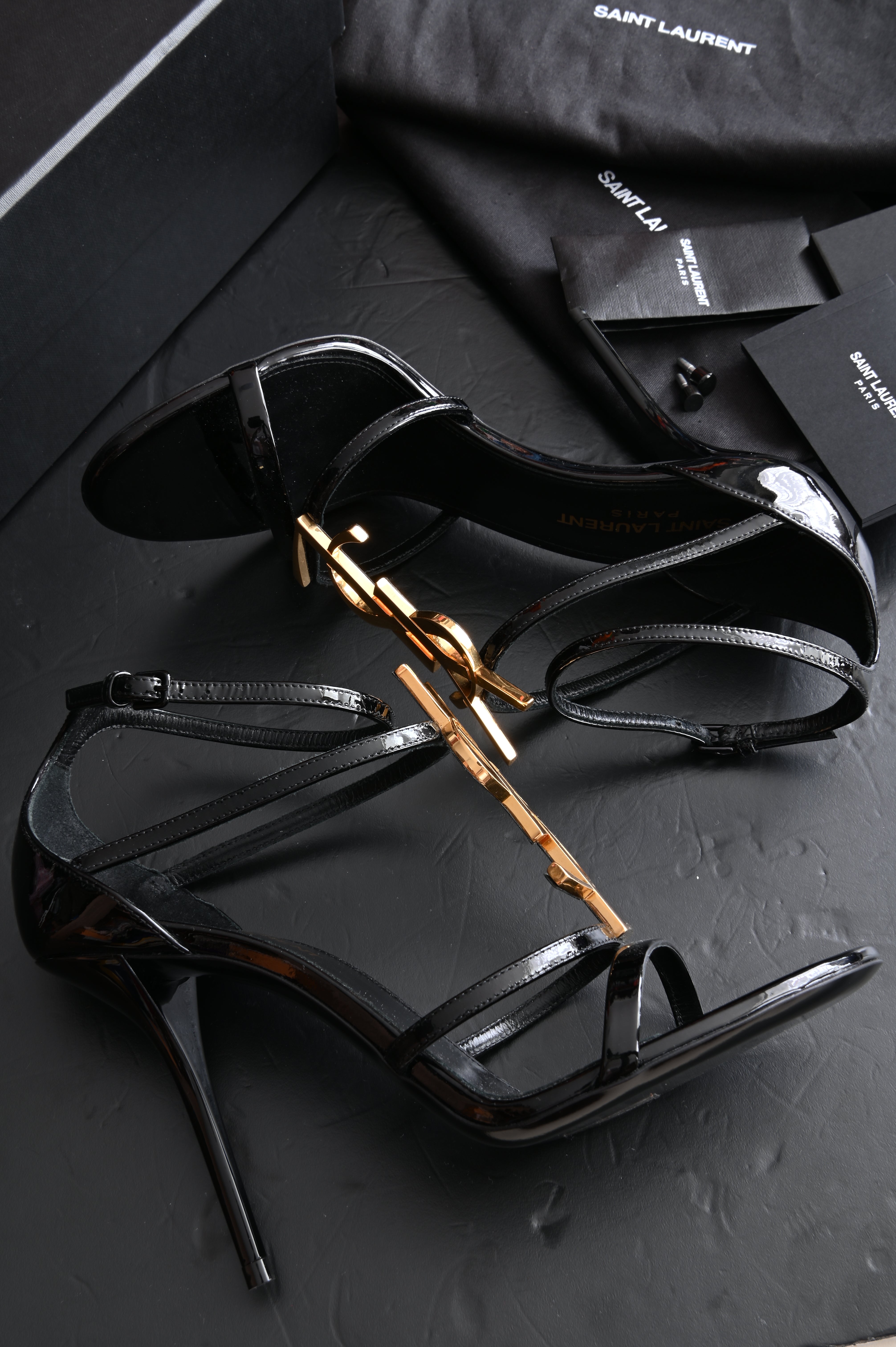 Saint Laurent Cassandra high-heel sandals in Black patent