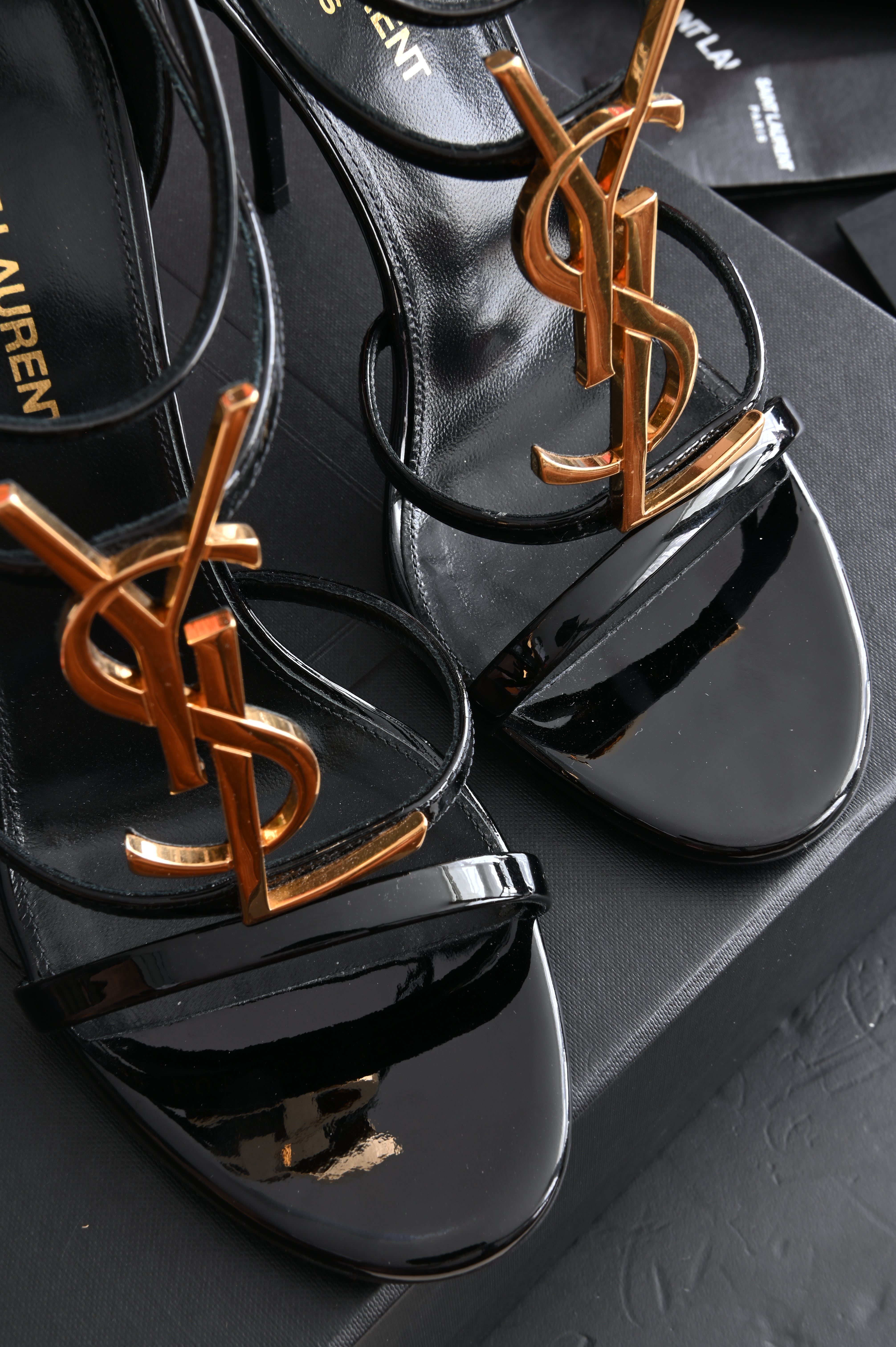 Saint Laurent Cassandra high-heel sandals in Black patent