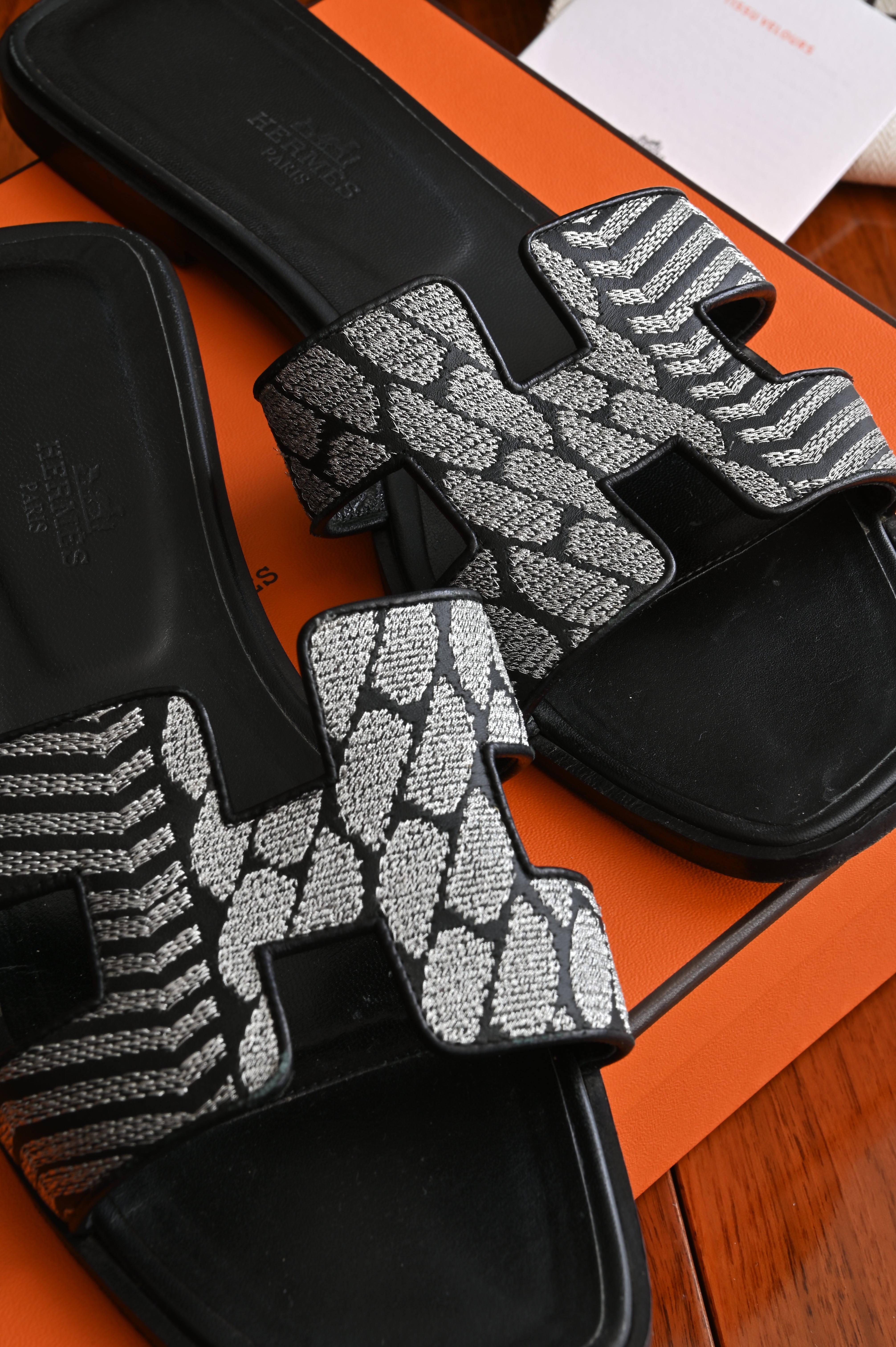 Hermès Oran in Black and Silver Embroidered Calf Sandals