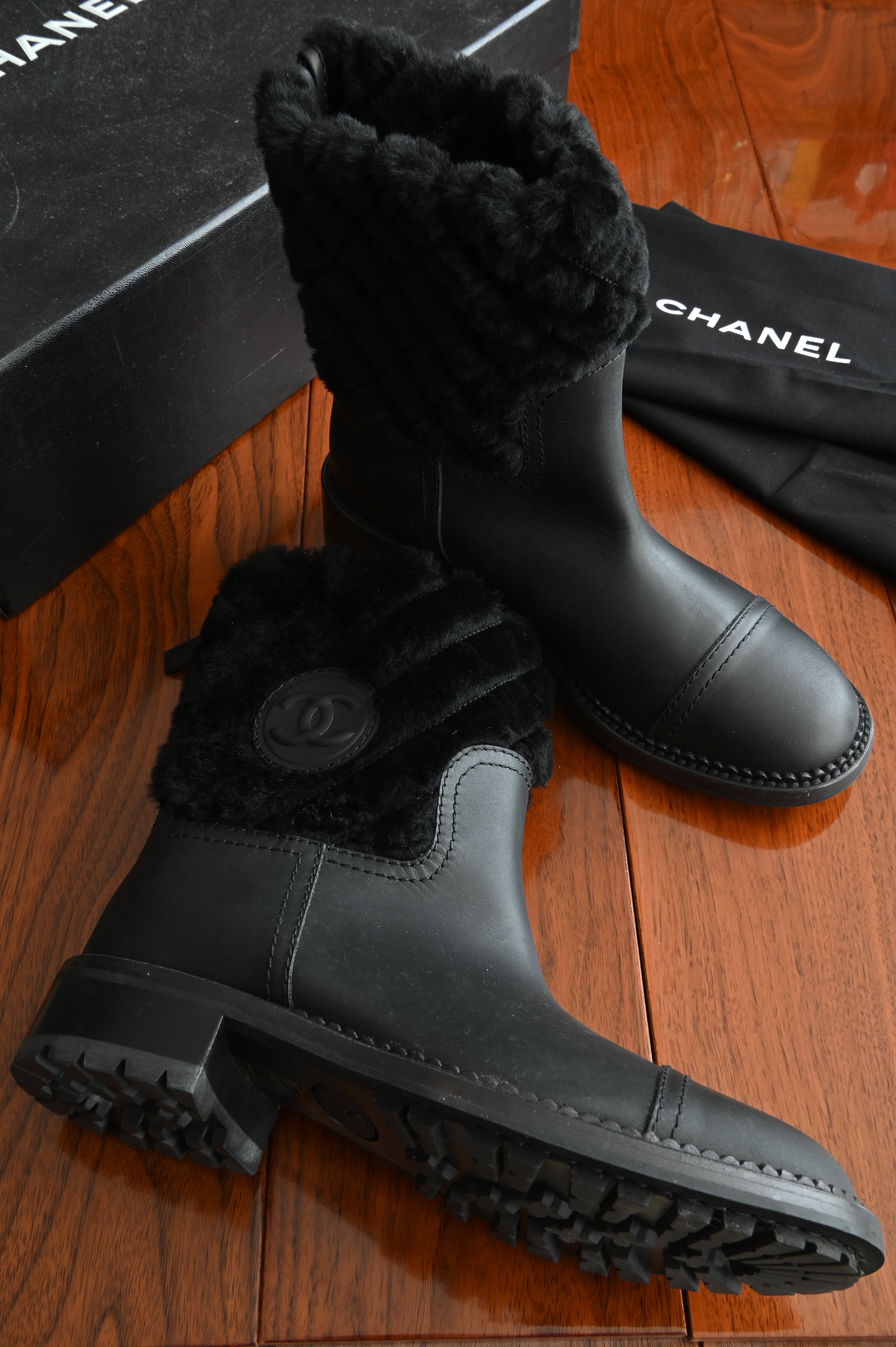 Chanel Black Leather Quilted Fur Boots