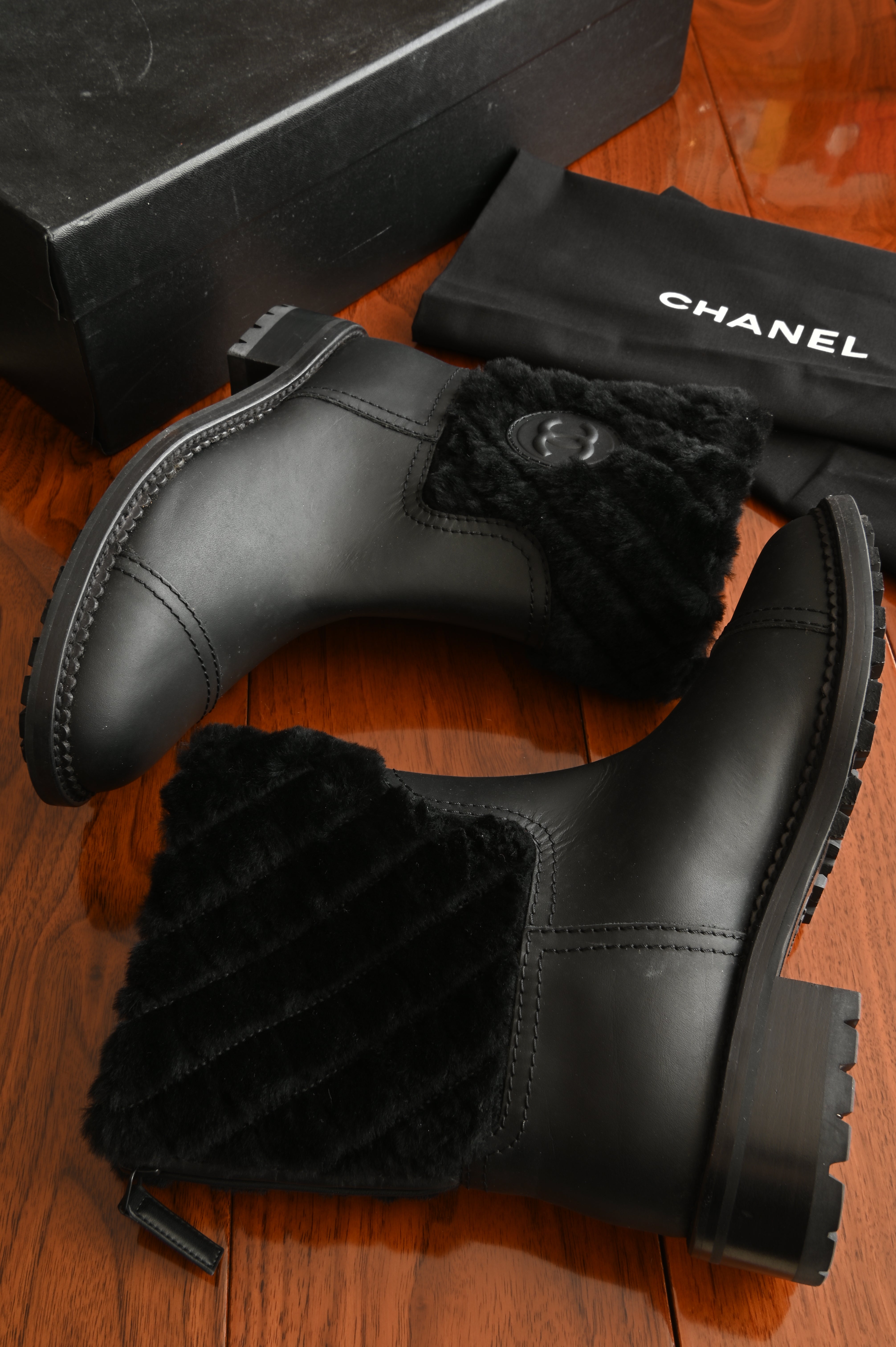 Chanel Black Leather Quilted Fur Boots