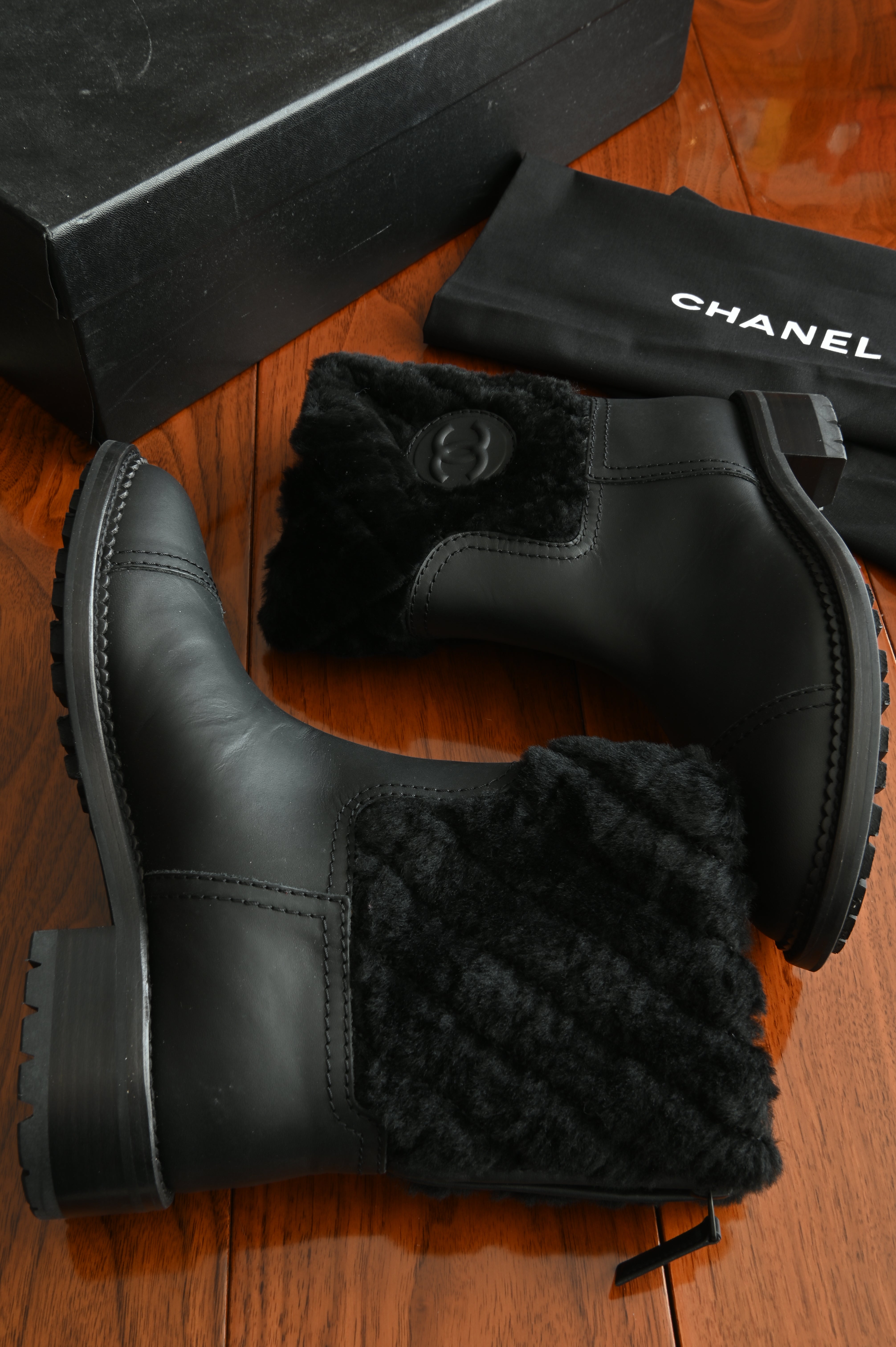 Chanel Black Leather Quilted Fur Boots