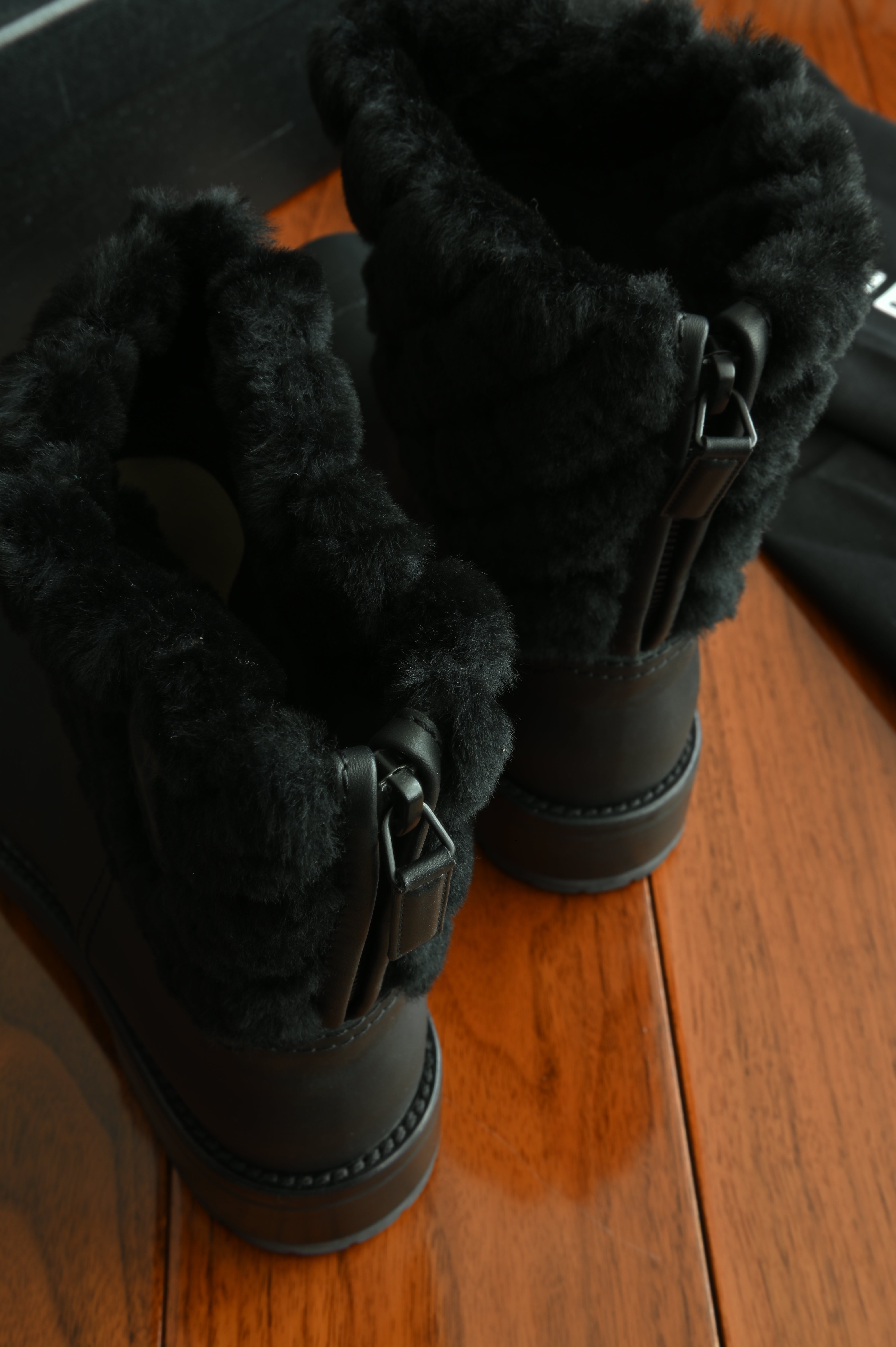 Chanel Black Leather Quilted Fur Boots