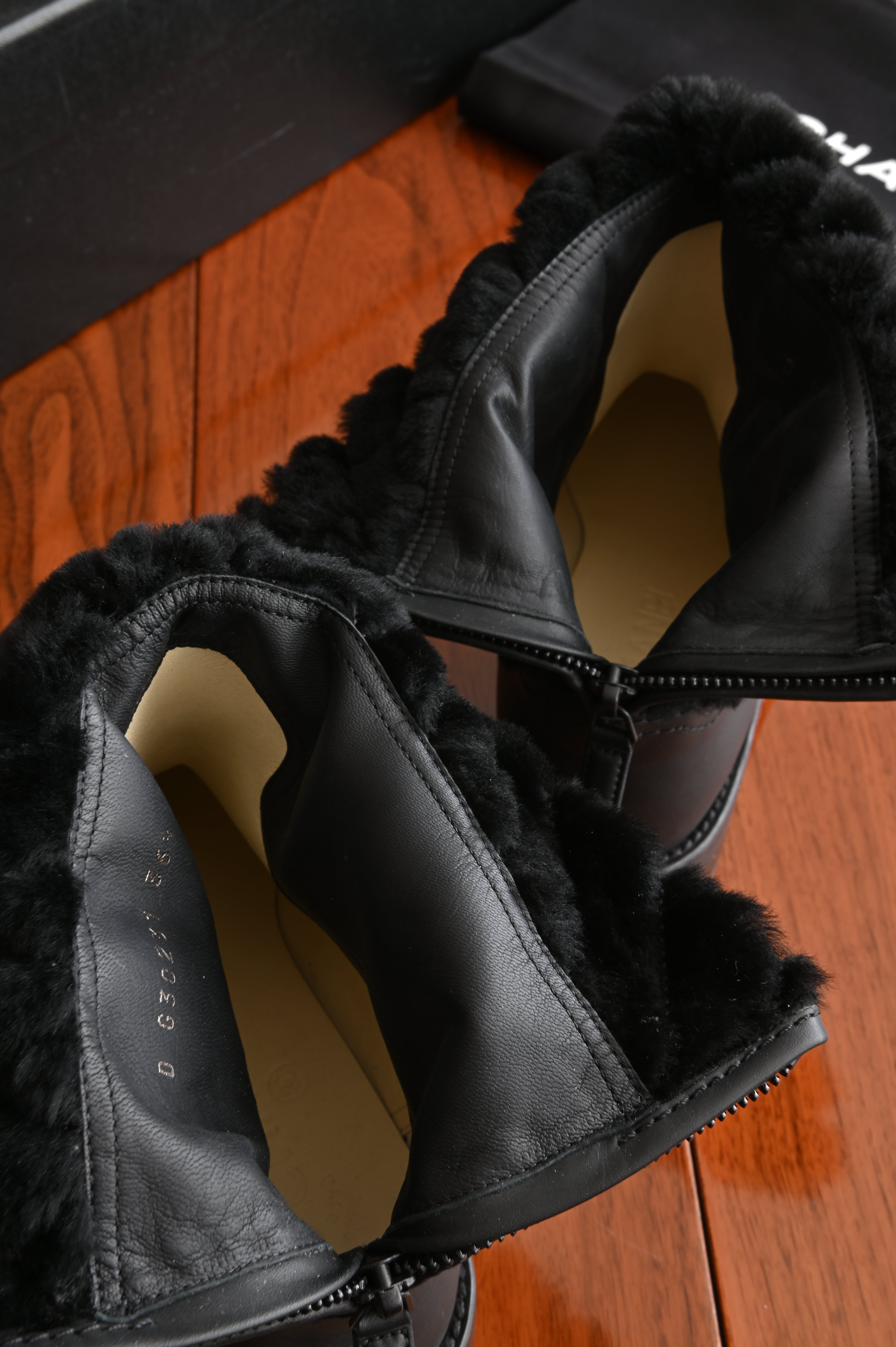 Chanel Black Leather Quilted Fur Boots