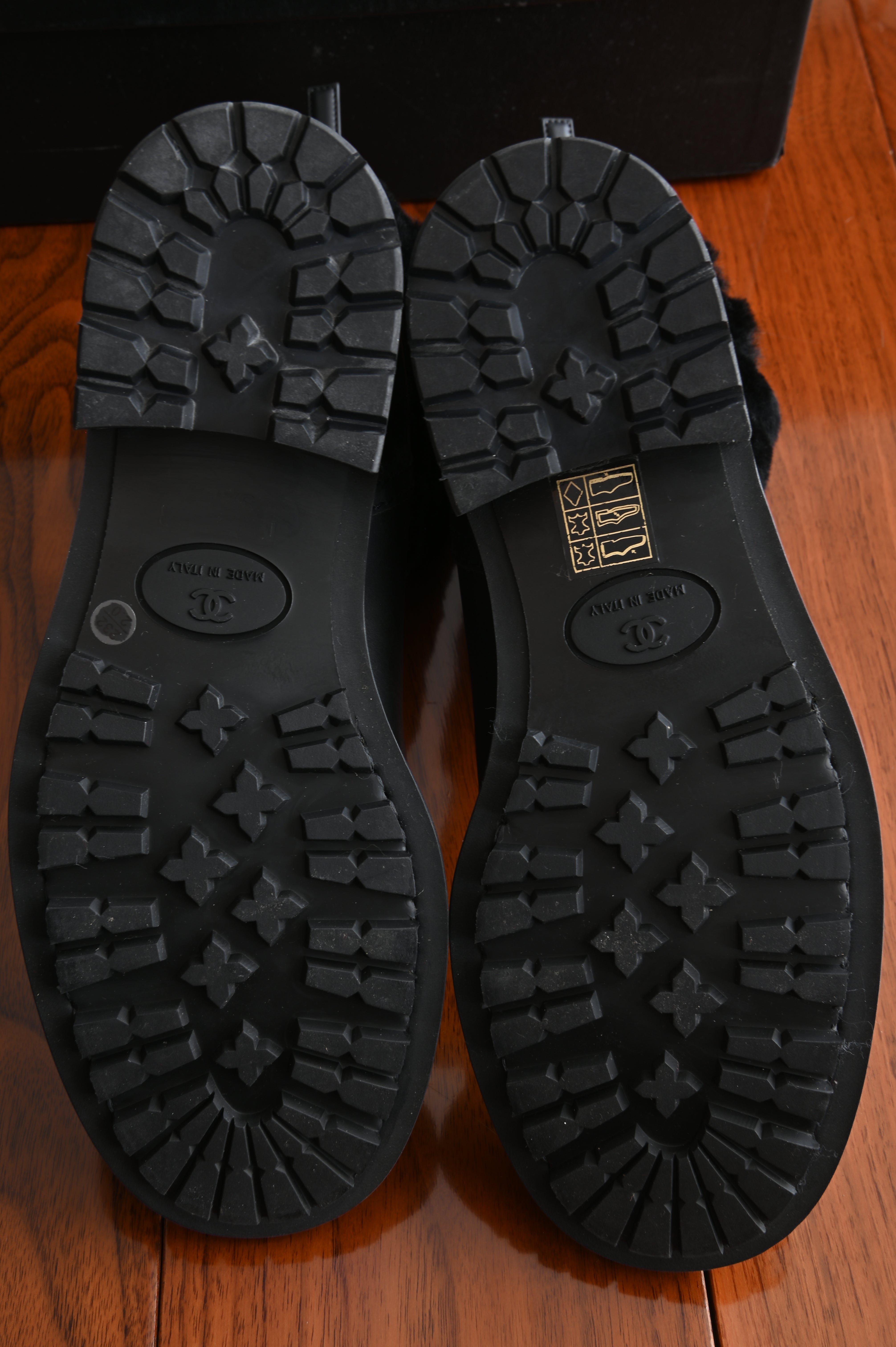 Chanel Black Leather Quilted Fur Boots