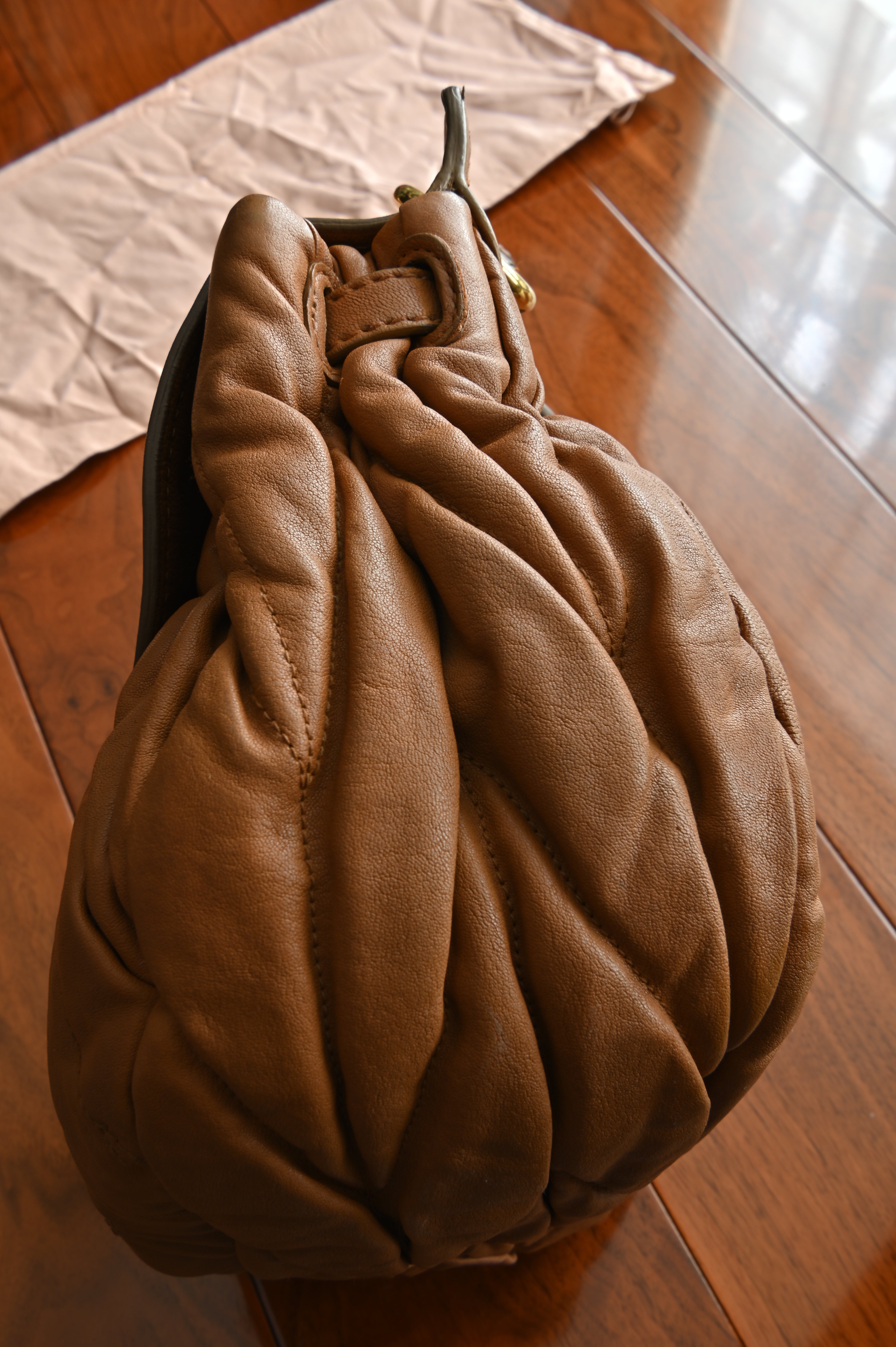 Miu Miu Coffer Matelassé leather hobo bag in Tan