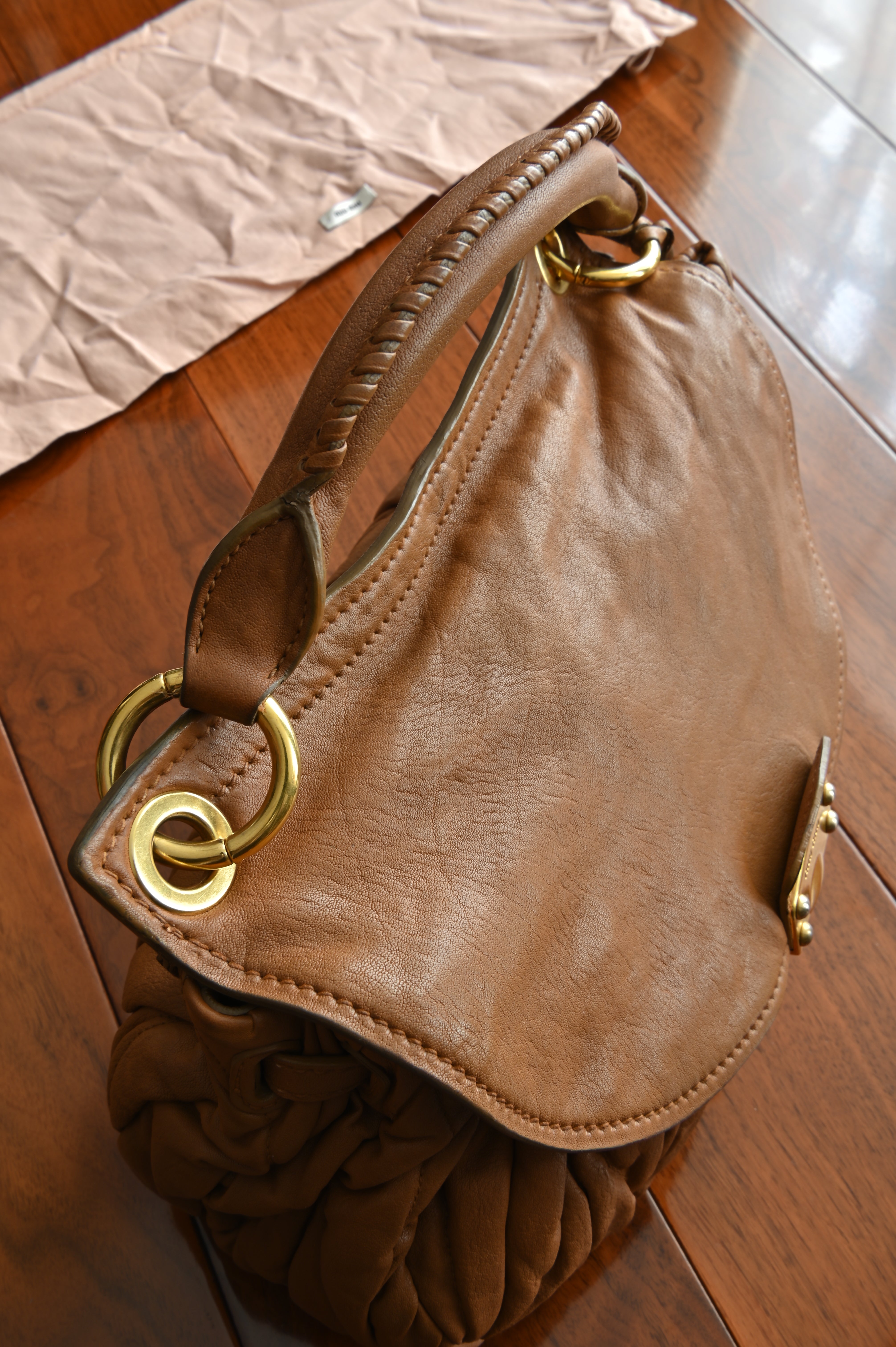 Miu Miu Coffer Matelassé leather hobo bag in Tan