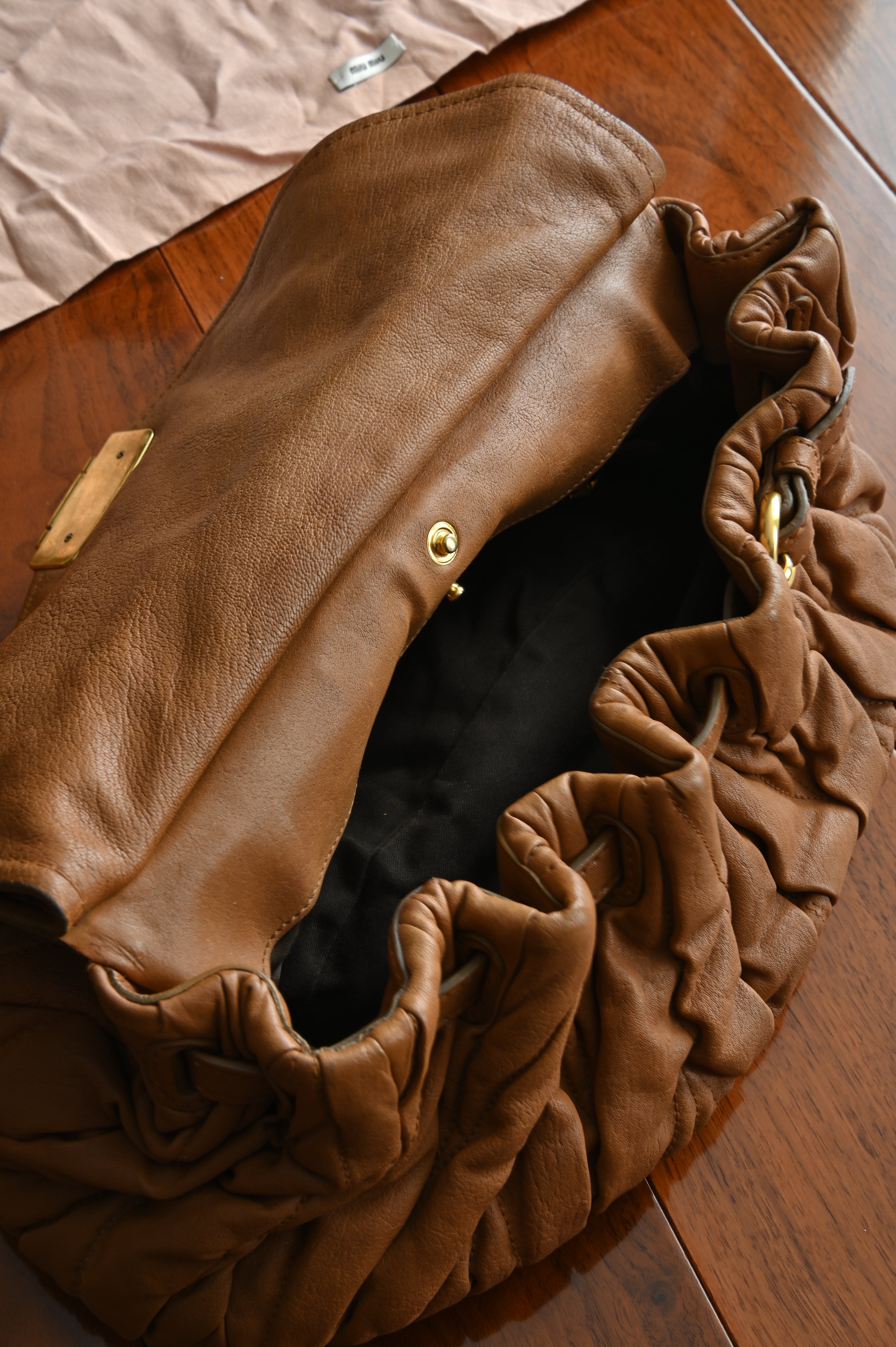 Miu Miu Coffer Matelassé leather hobo bag in Tan