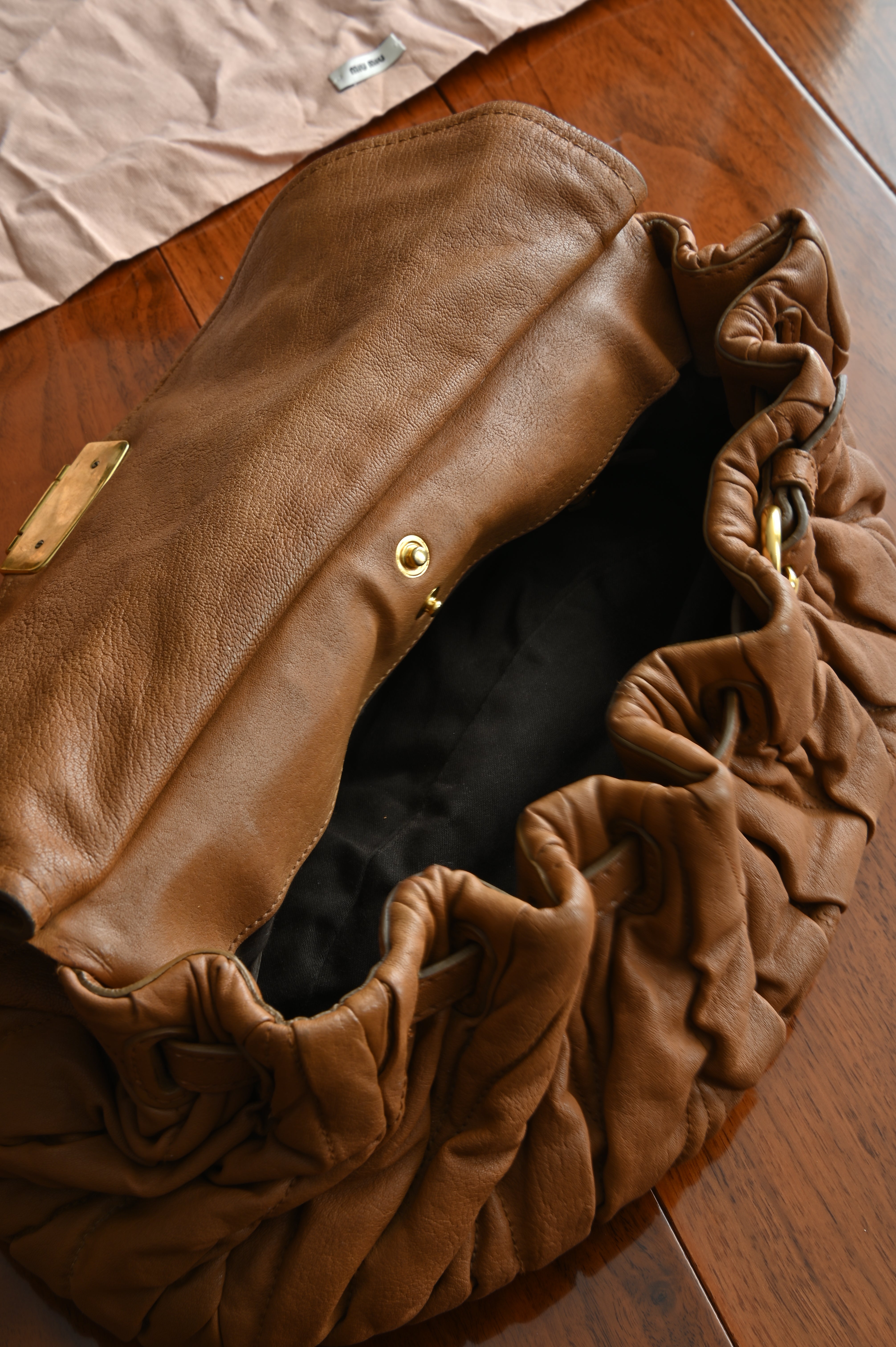 Miu Miu Coffer Matelassé leather hobo bag in Tan