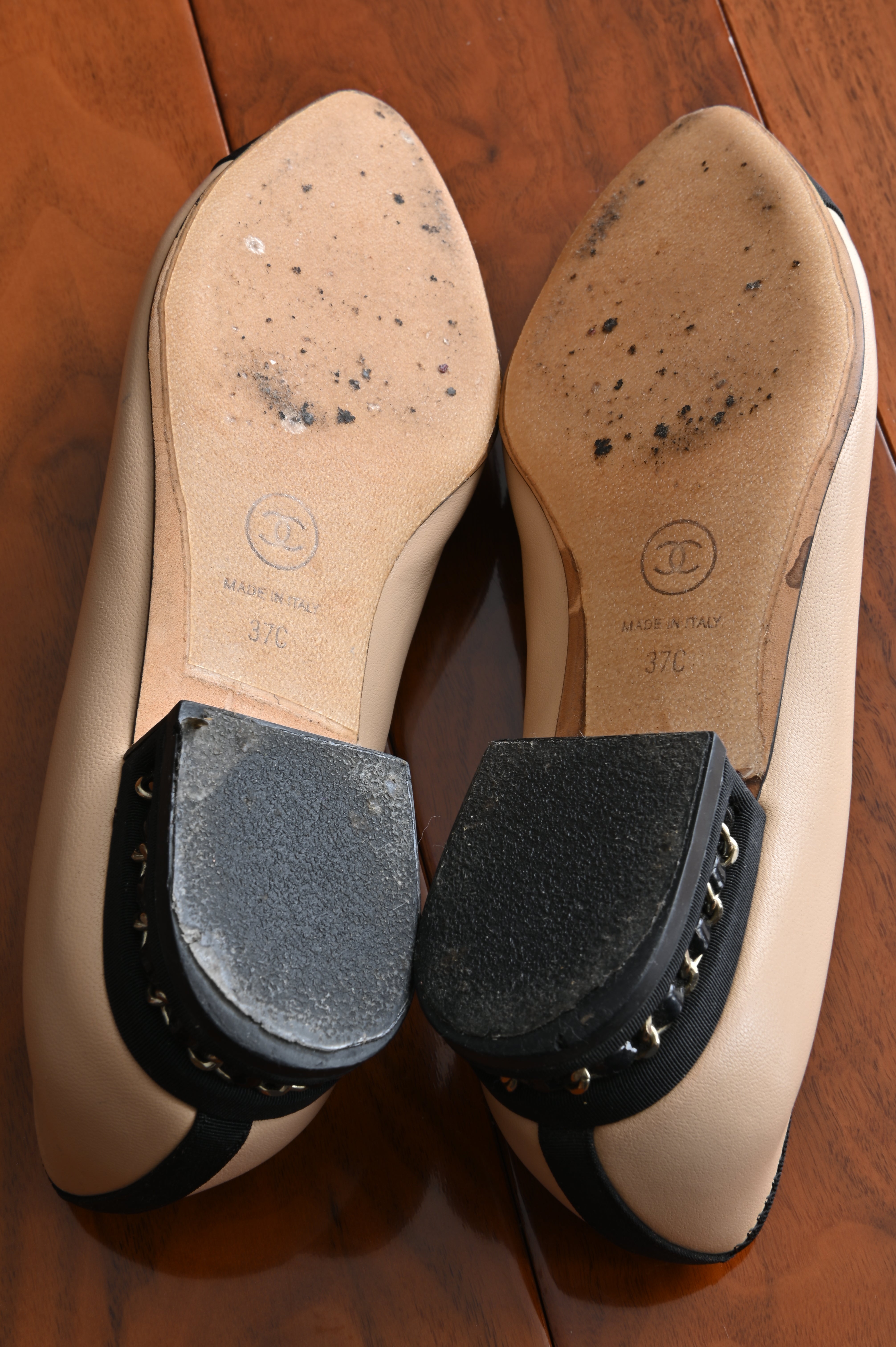 Chanel classic two-toned loafers with chain heel details