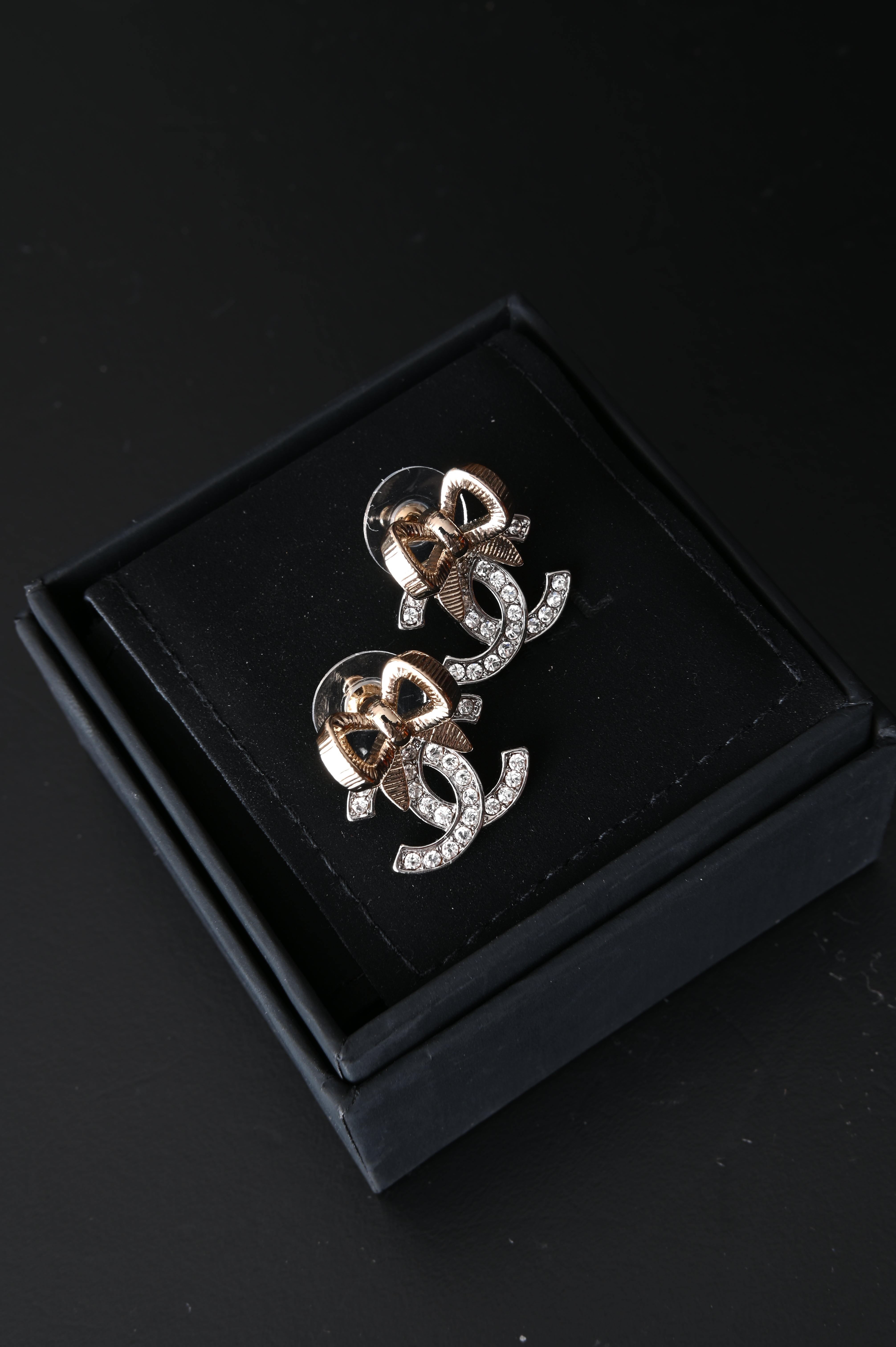 Chanel CC bow earrings with crystals