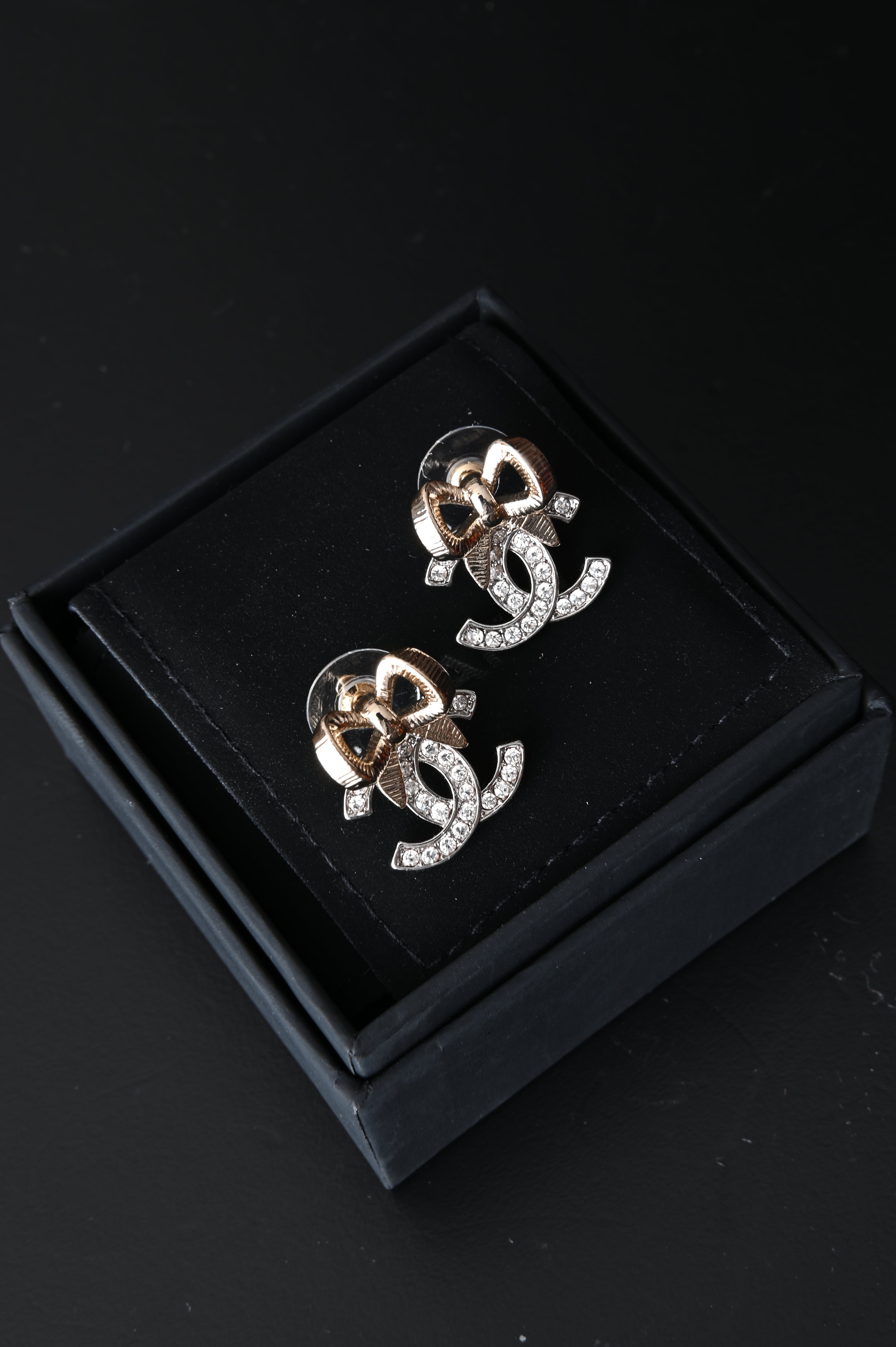 Chanel CC bow earrings with crystals