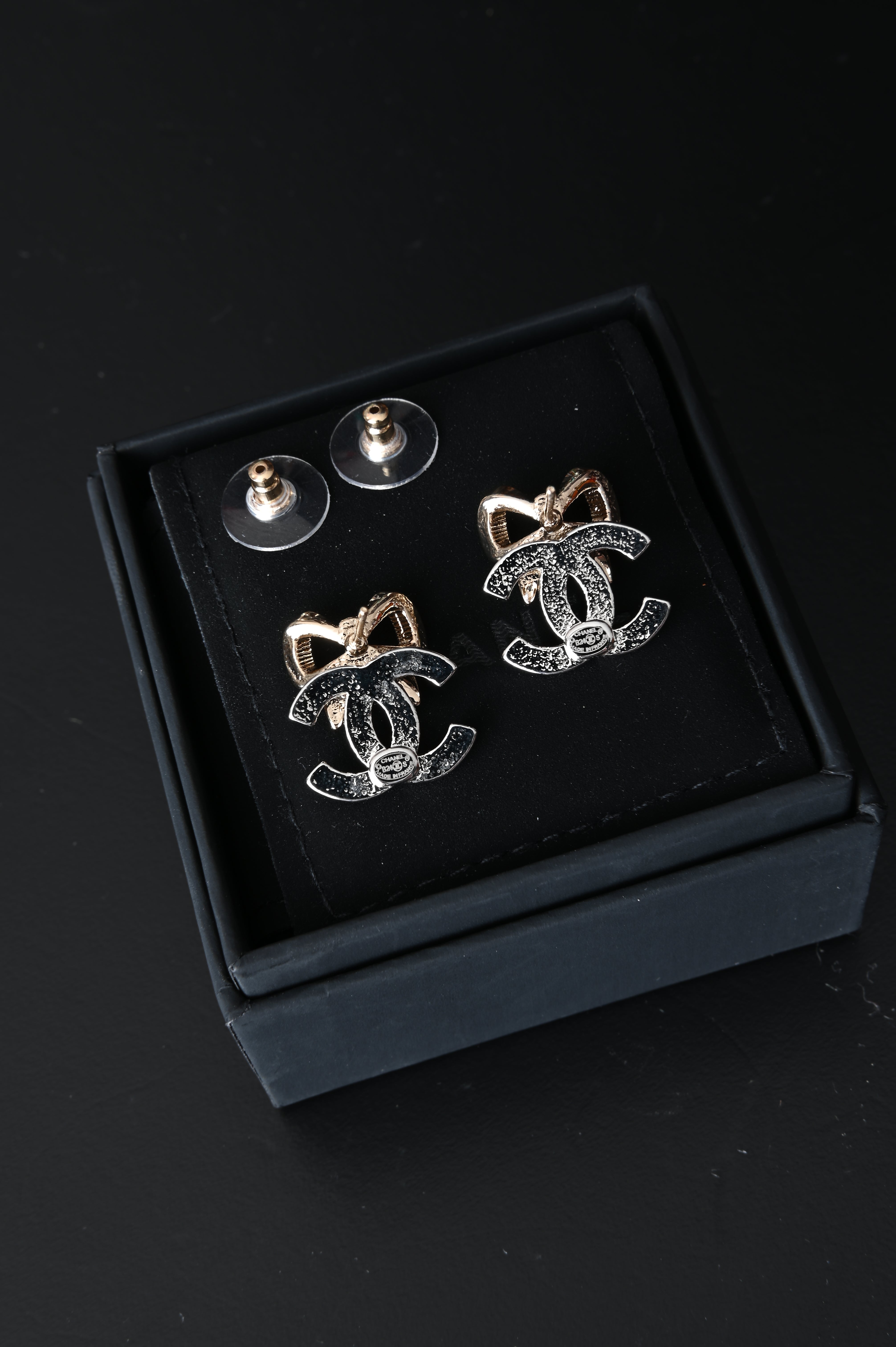 Chanel CC bow earrings with crystals