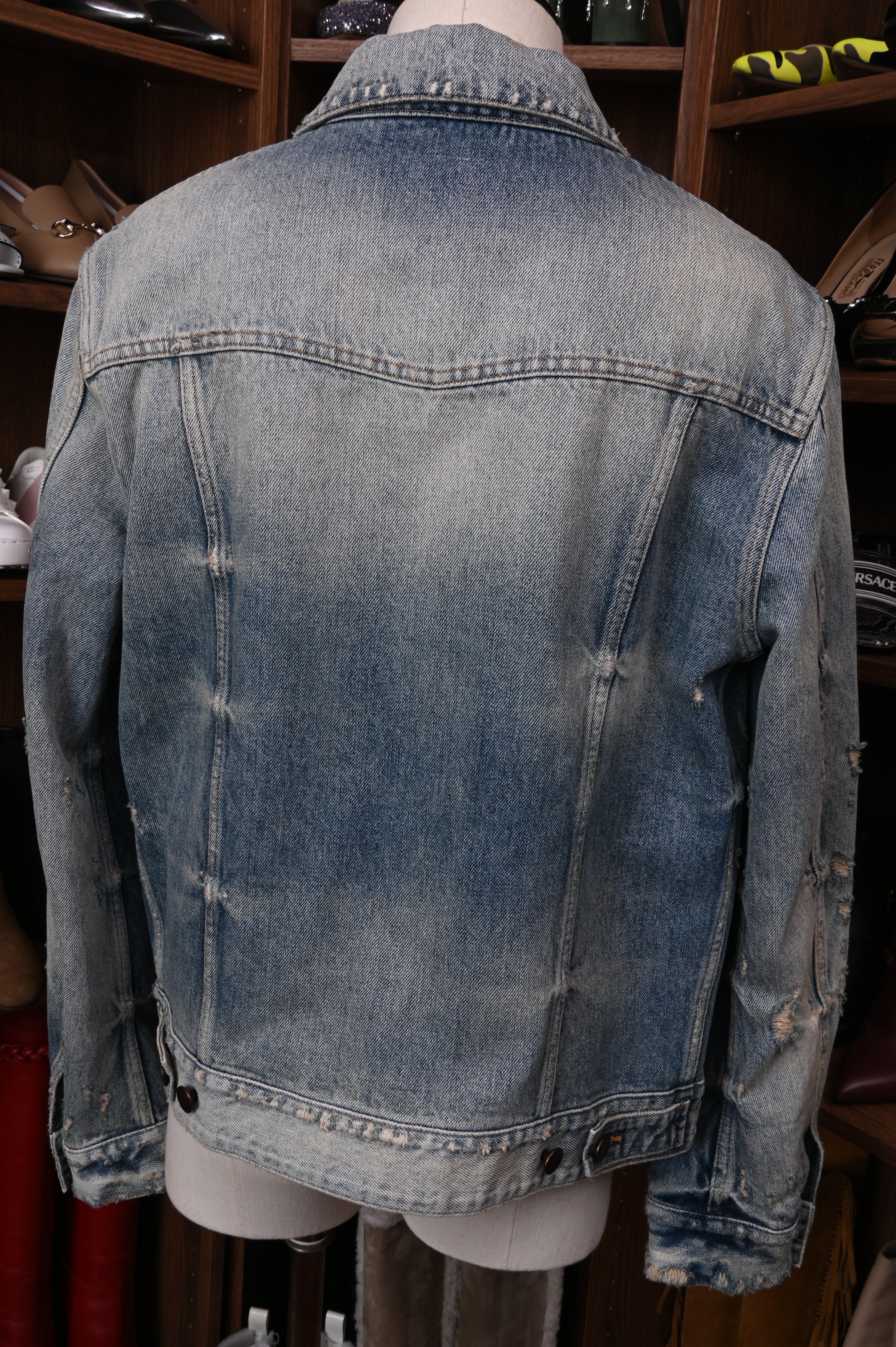 Saint Laurent Dirt-wash distressed indigo cotton denim button-front jean jacket