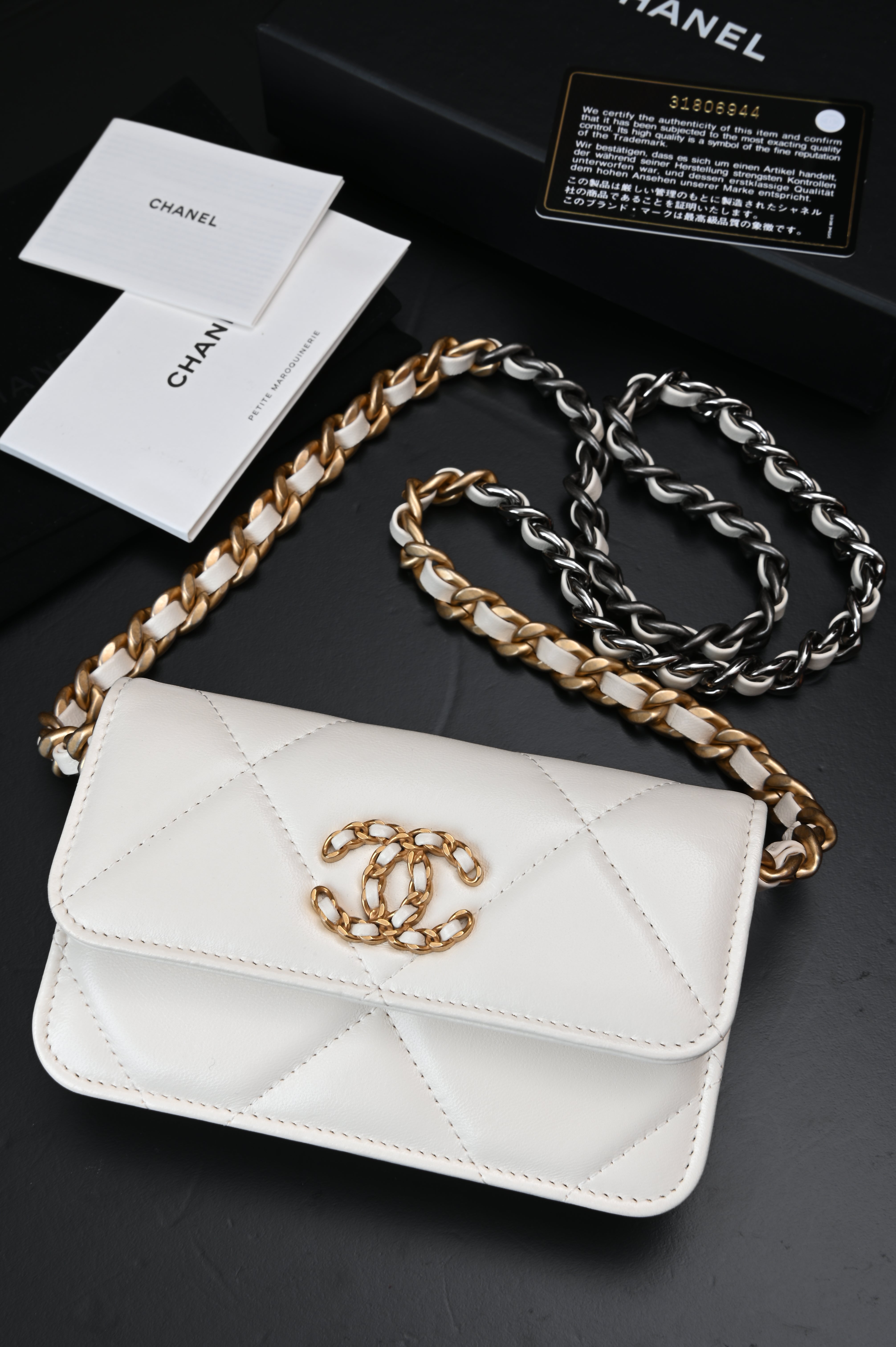 Chanel White Quilted Lambskin Chanel 19 Flap Clutch Gold and Ruthenium Hardware, 2021