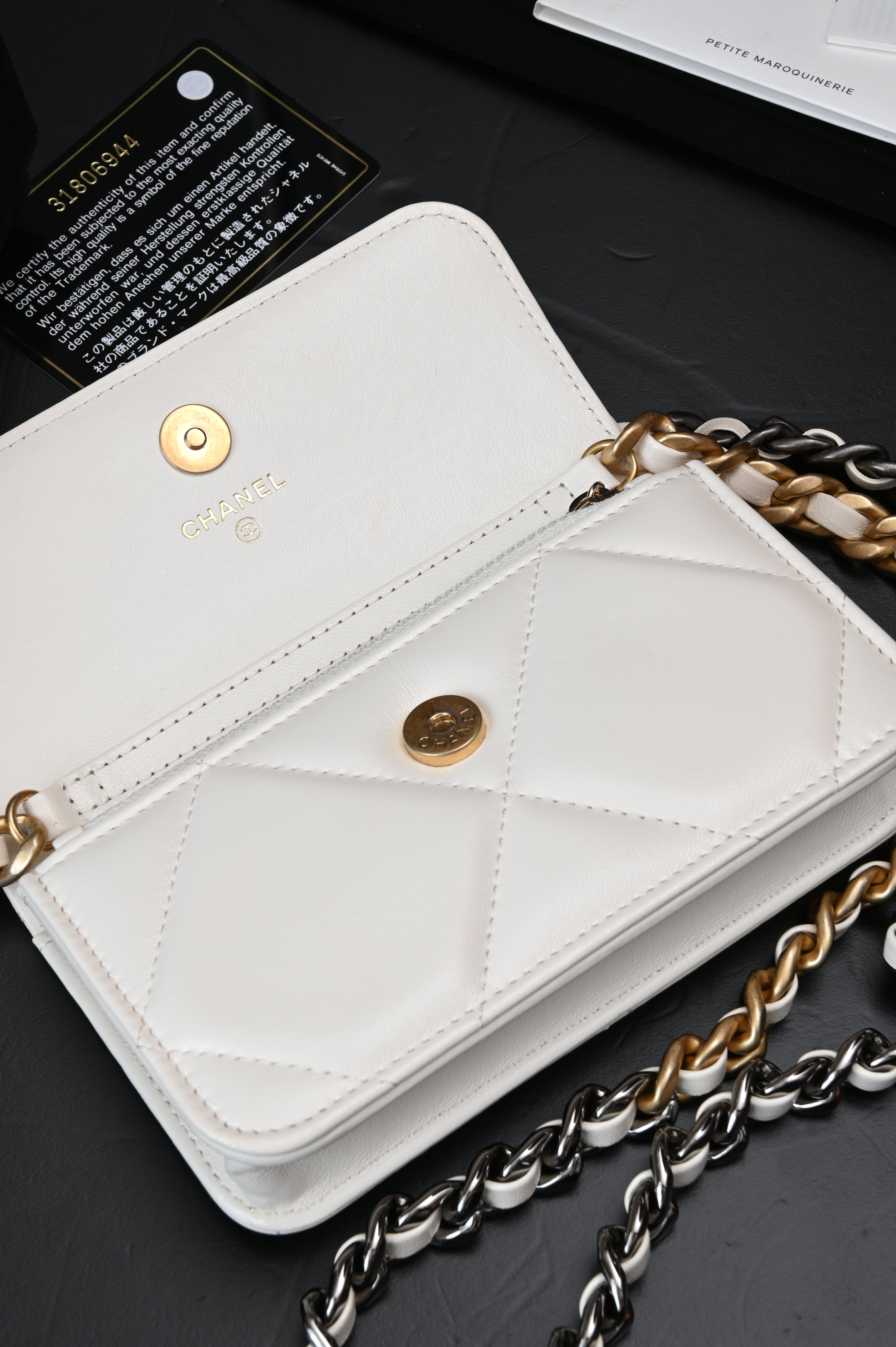 Chanel White Quilted Lambskin Chanel 19 Flap Clutch Gold and Ruthenium Hardware, 2021