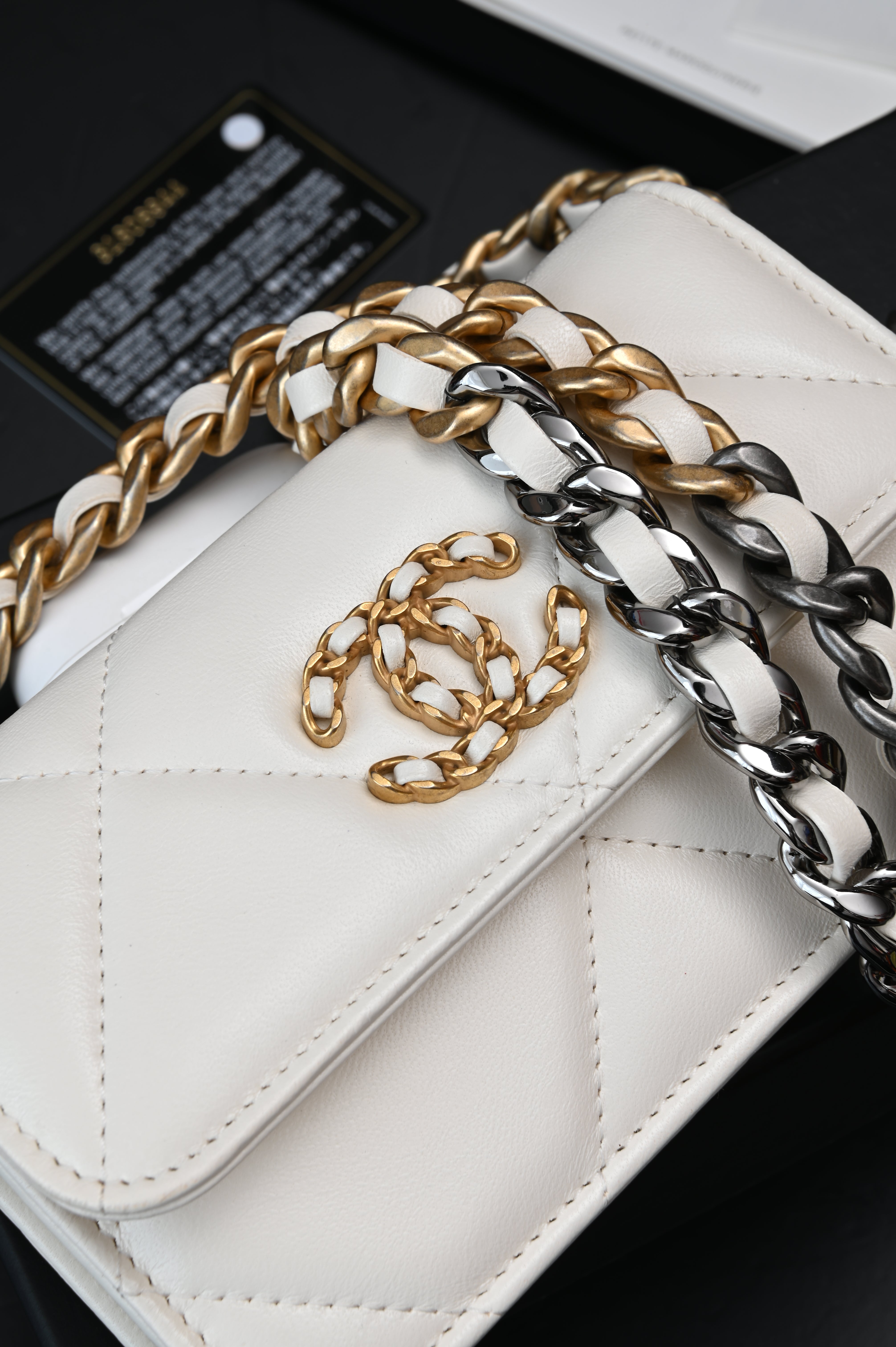 Chanel White Quilted Lambskin Chanel 19 Flap Clutch Gold and Ruthenium Hardware, 2021