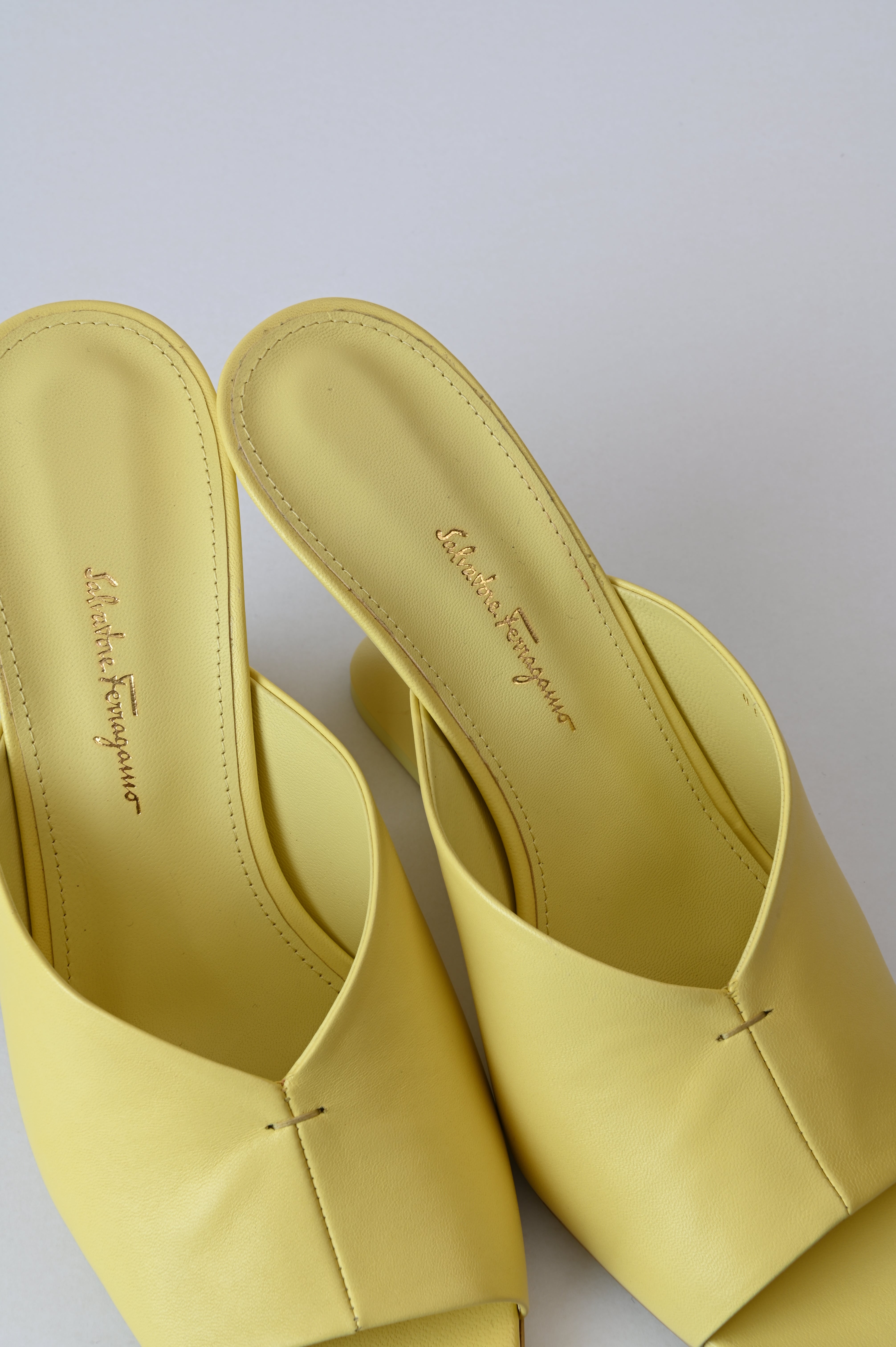 Salvatore Ferragamo Sansu f-heel slide sandal in Pastel yellow
