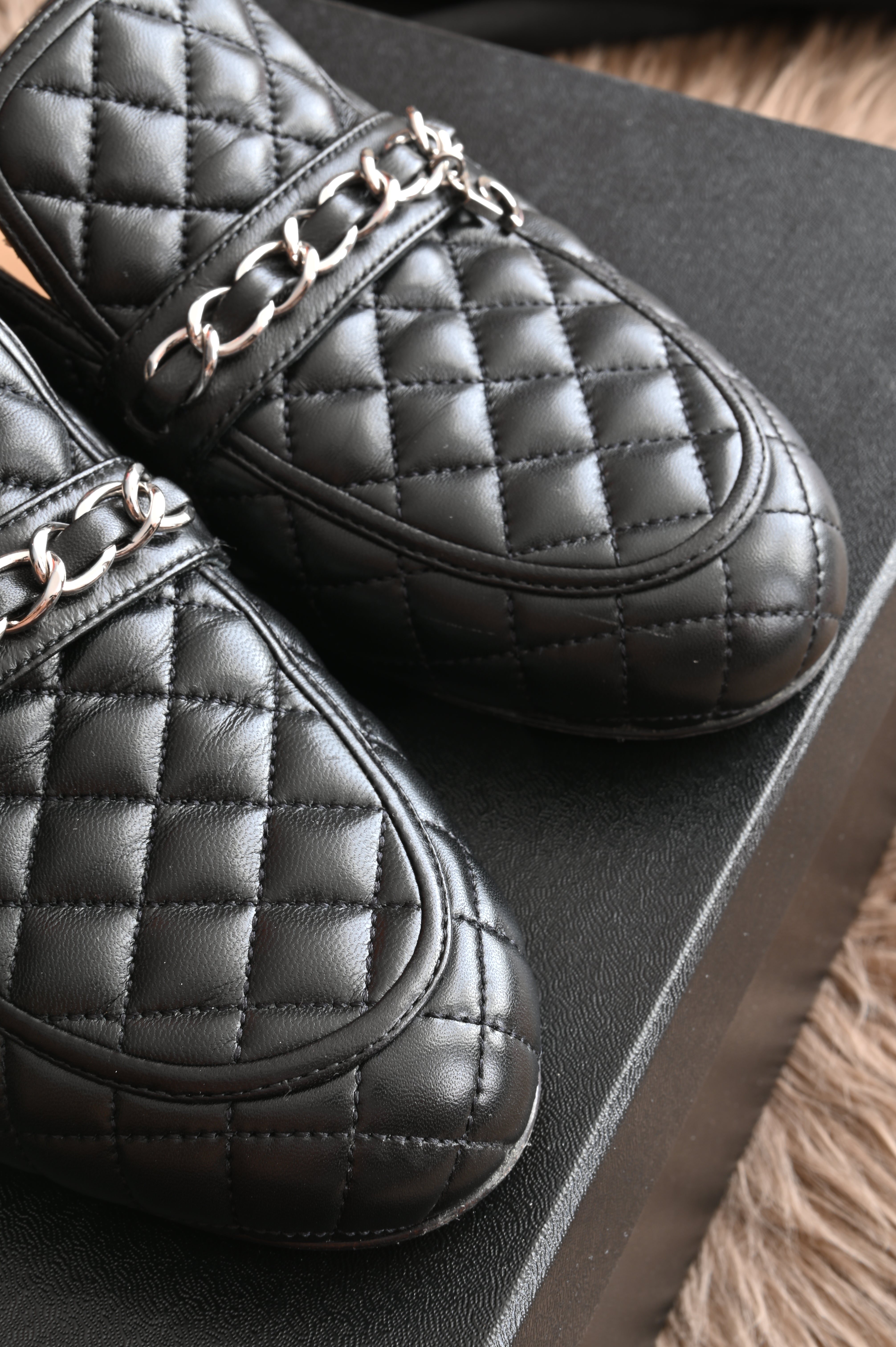 Chanel CC Quilted mules in black and silver hardware