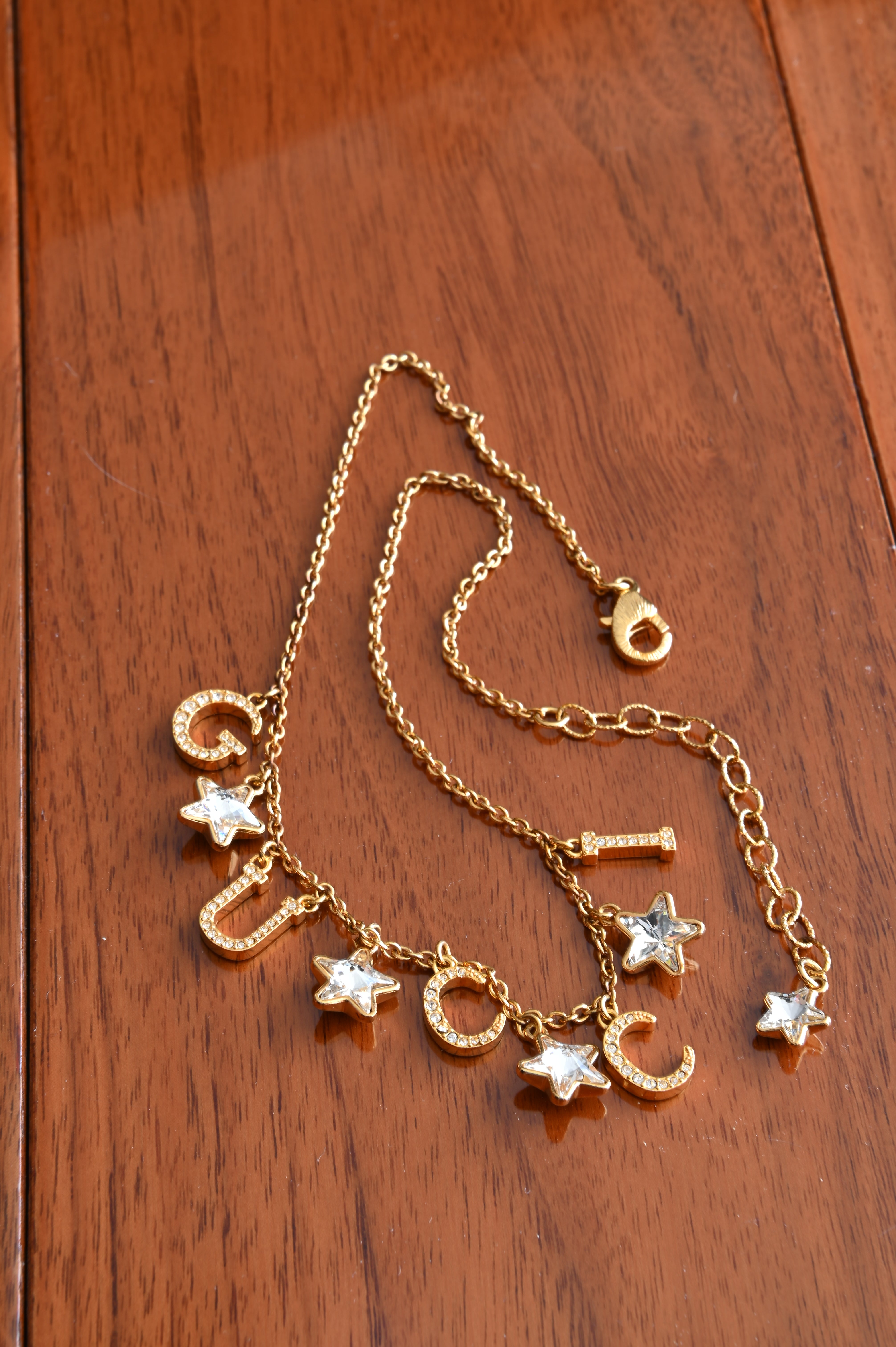 Gucci Charm Necklace with crystals in Gold hardware angle three
