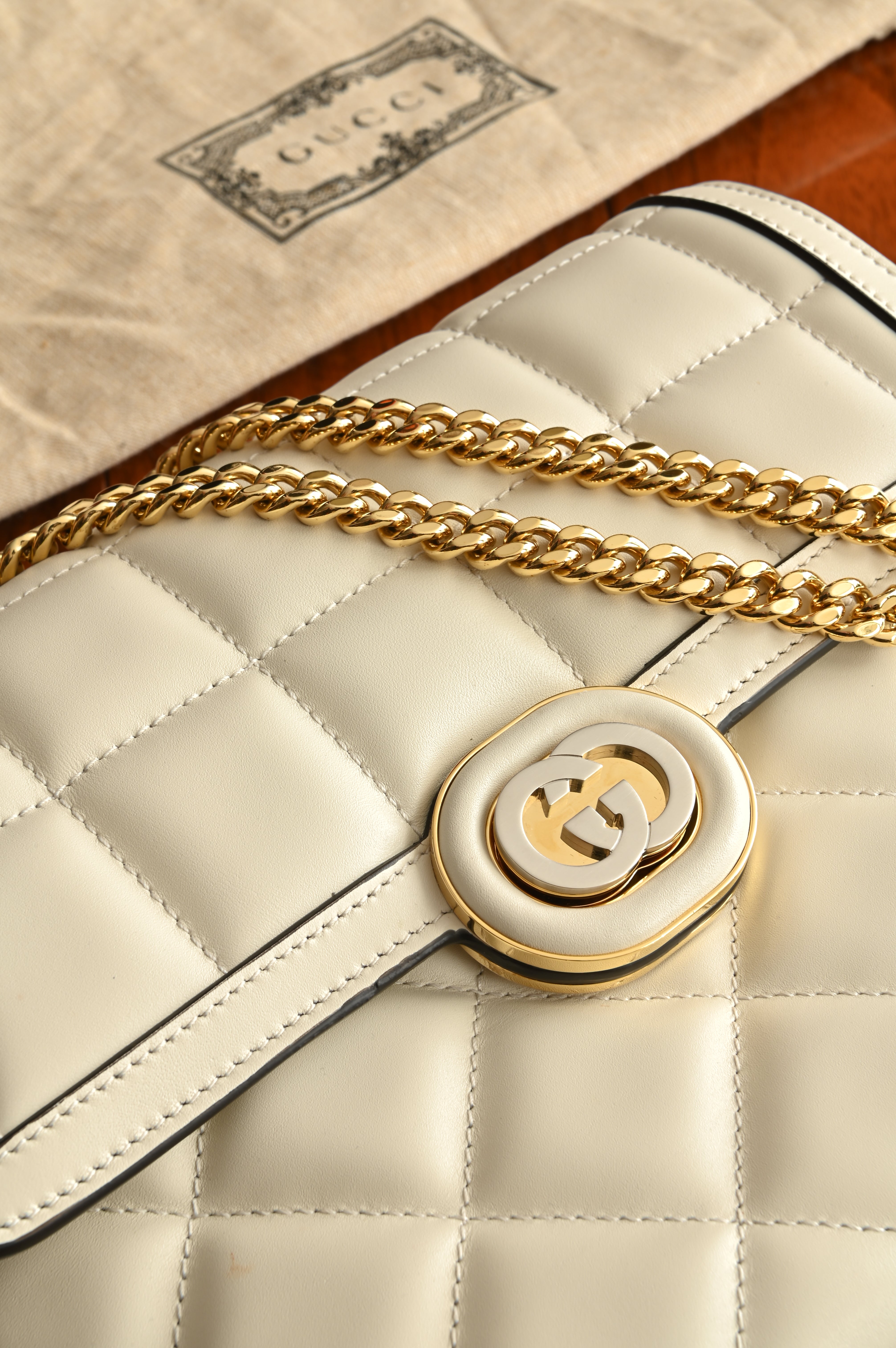 Gucci Deco Small Shoulder Bag in White Quilted Calf leather with Gold Silver-toned Lock logo