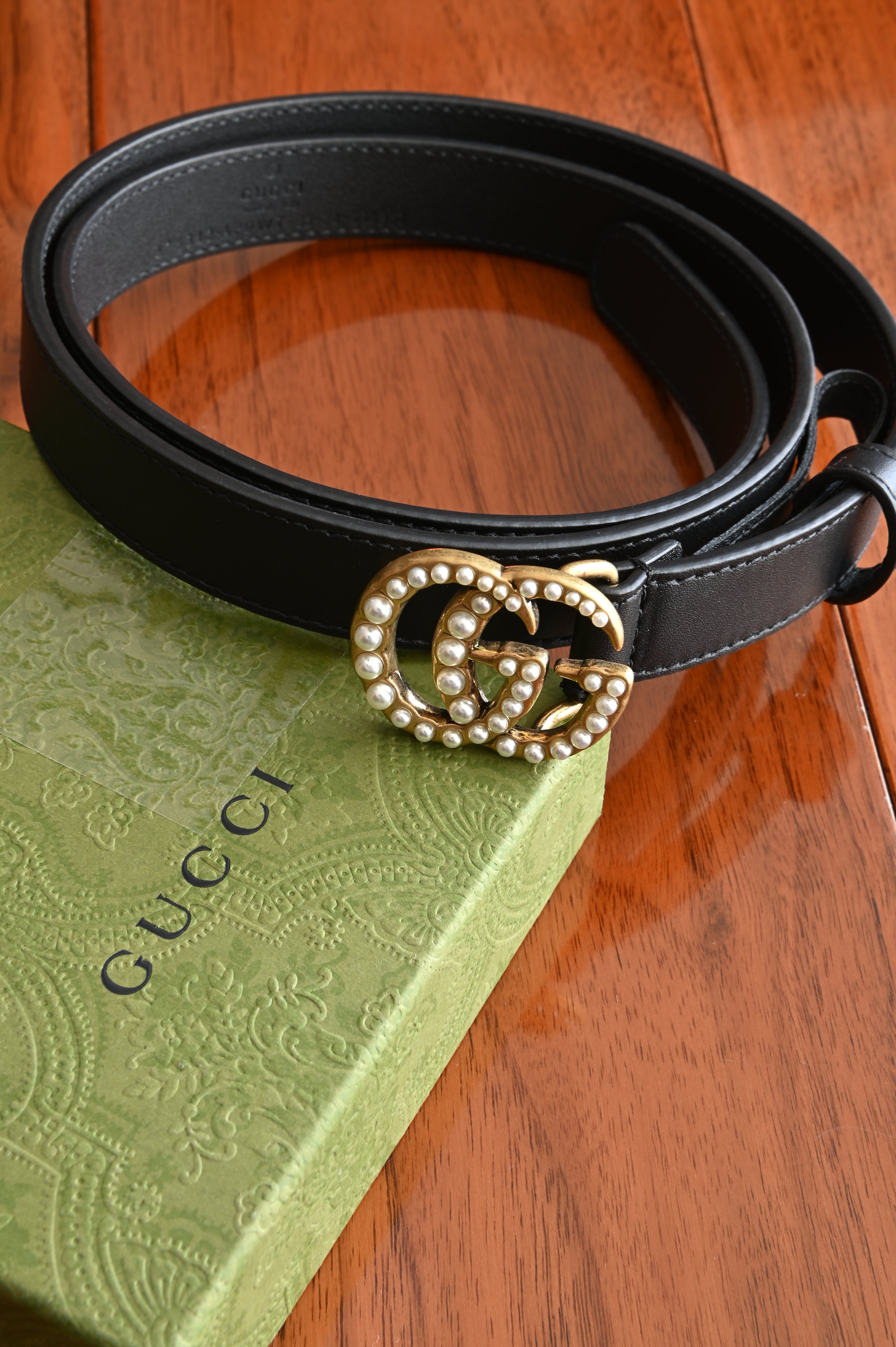 Gucci GG belt with pearl in Gold hardware and black calf angle
