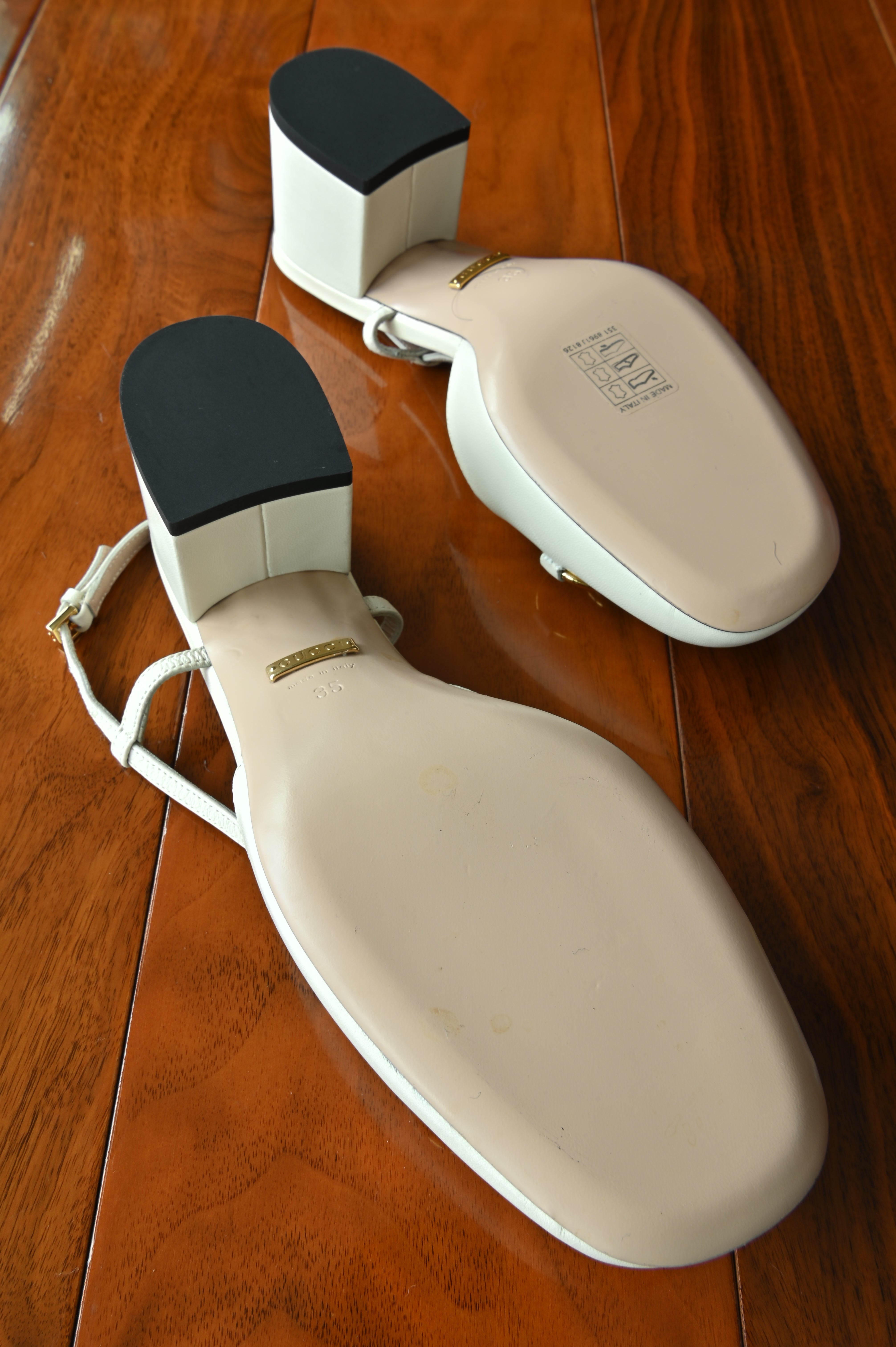 Gucci White Horsebit Lamb Leather Slingback Pumps bottom two
