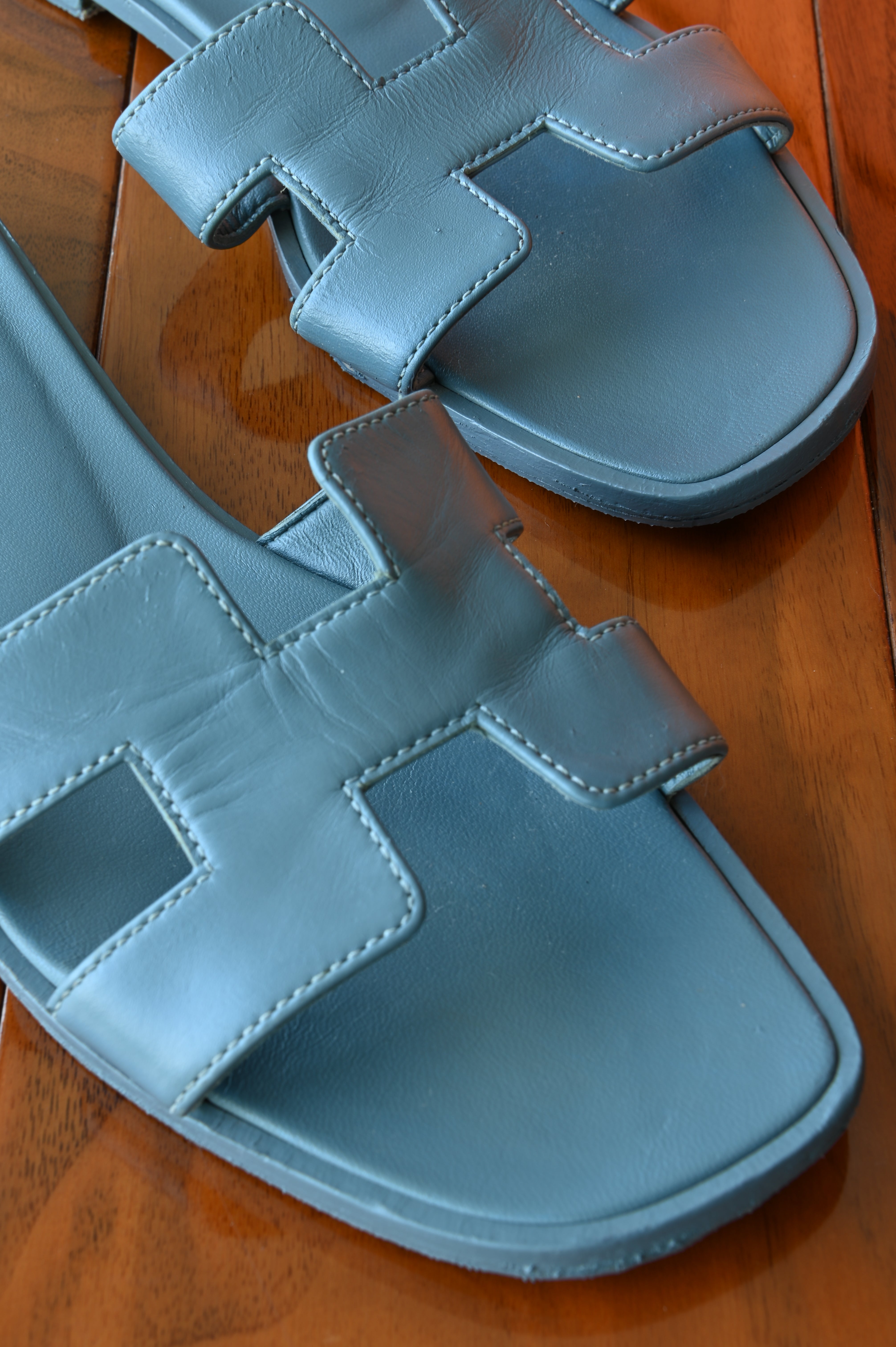 Hermes Blue Oran Sandals front