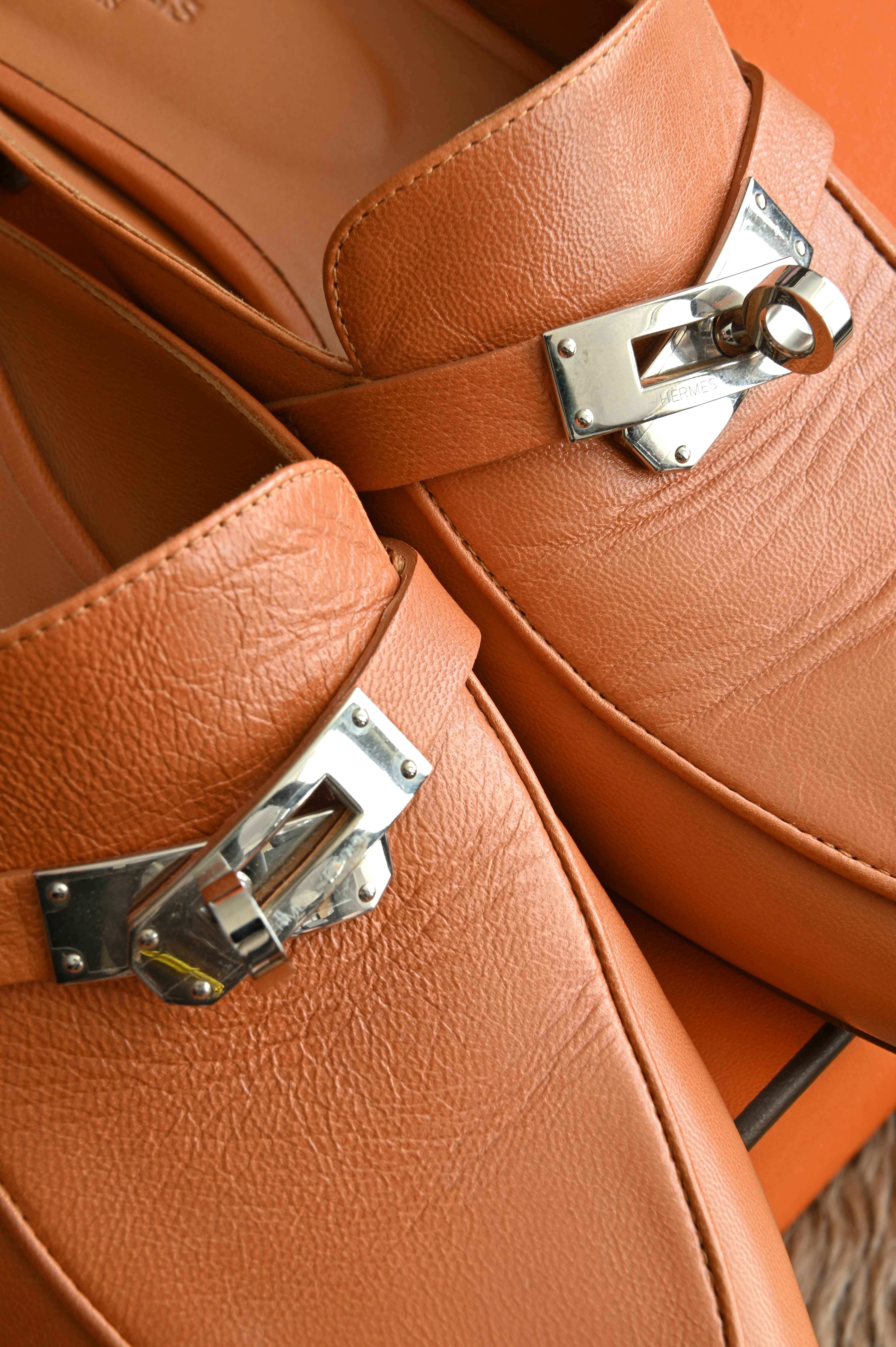 Hermes Oz mules in Tan design close up