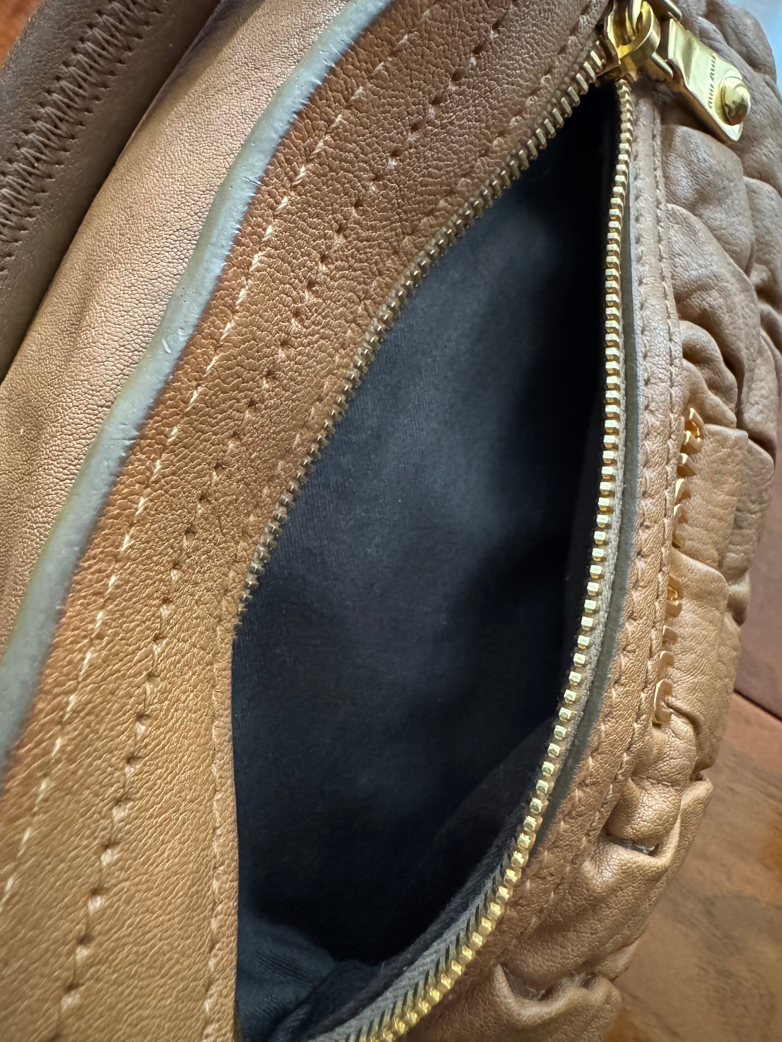 Miu Miu Coffer Matelassé leather hobo bag in Tan