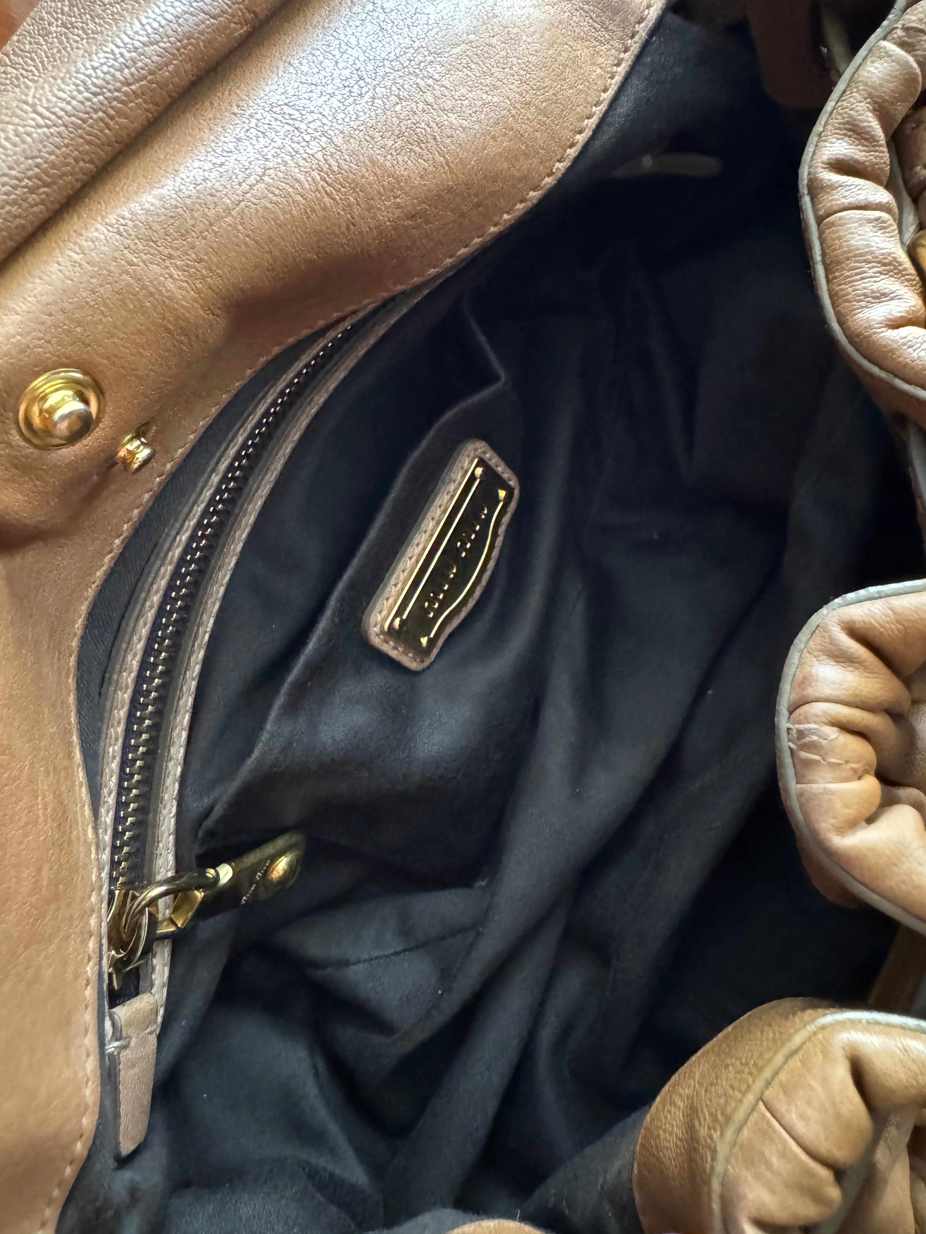 Miu Miu Coffer Matelassé leather hobo bag in Tan