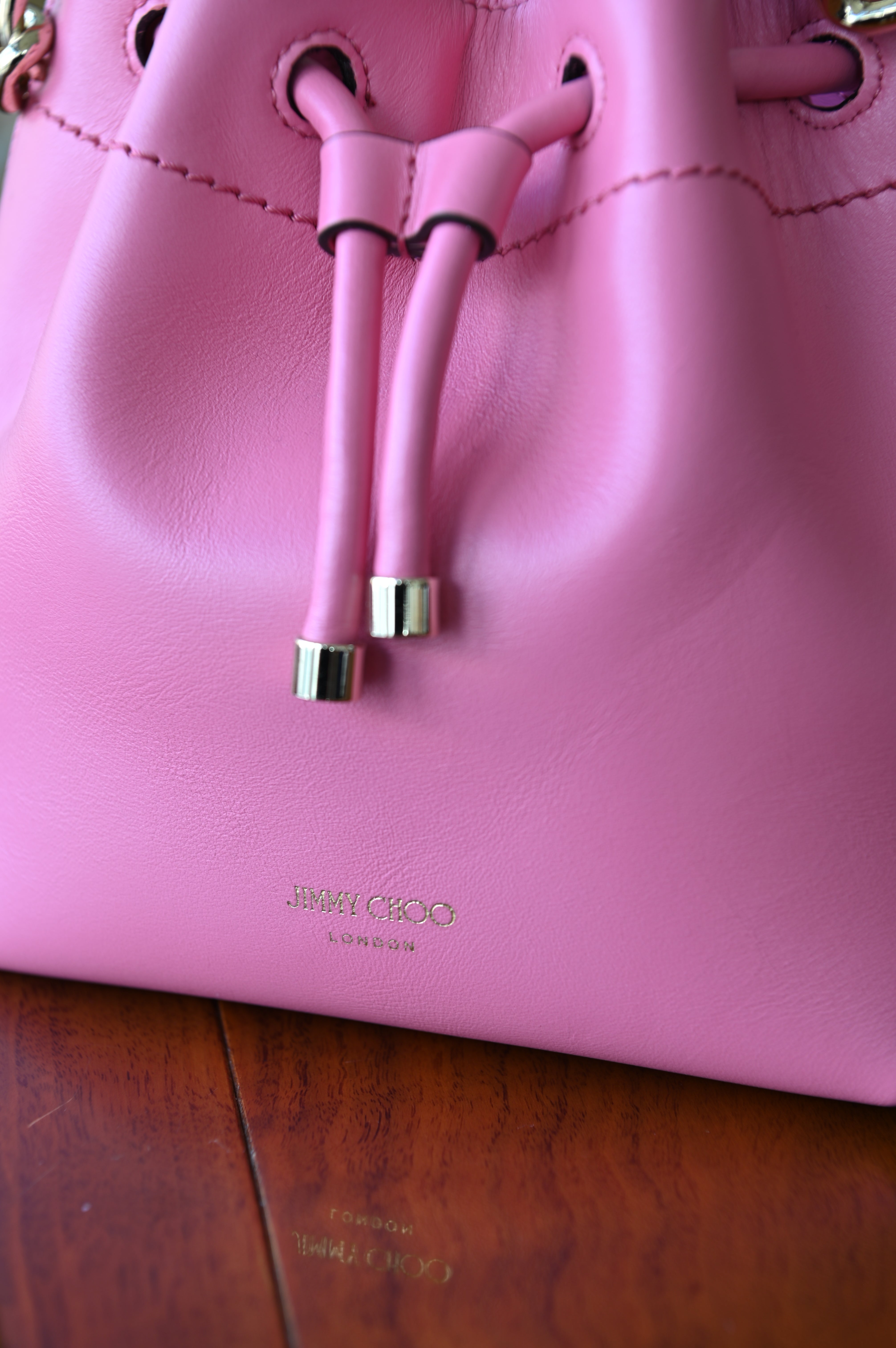 Jimmy Choo Pink Bon Bon Bucket Bag logo